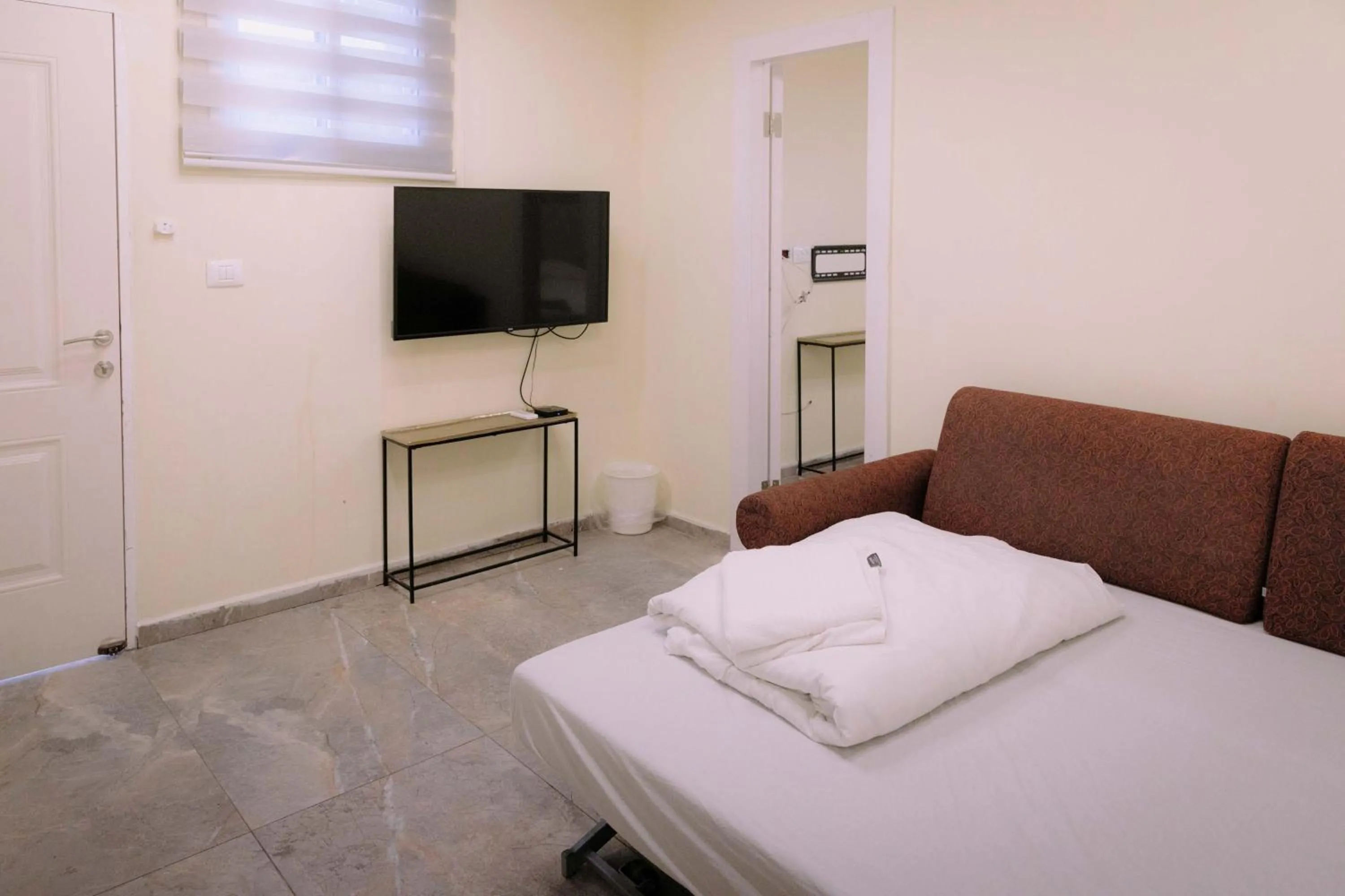 Bed in Rich Luxury Suites