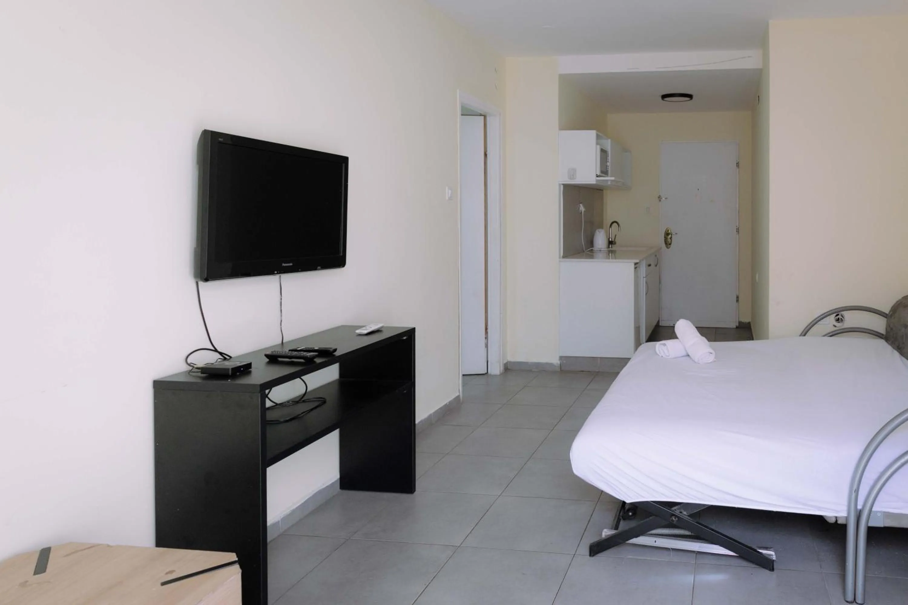 Bed in Rich Luxury Suites