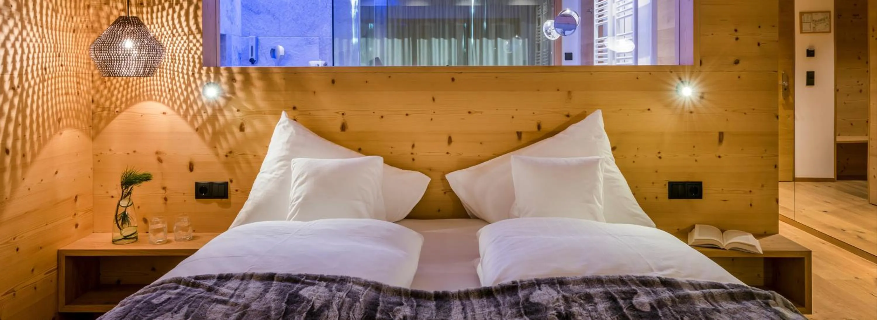 Bed in Tratterhof Mountain Sky Hotel