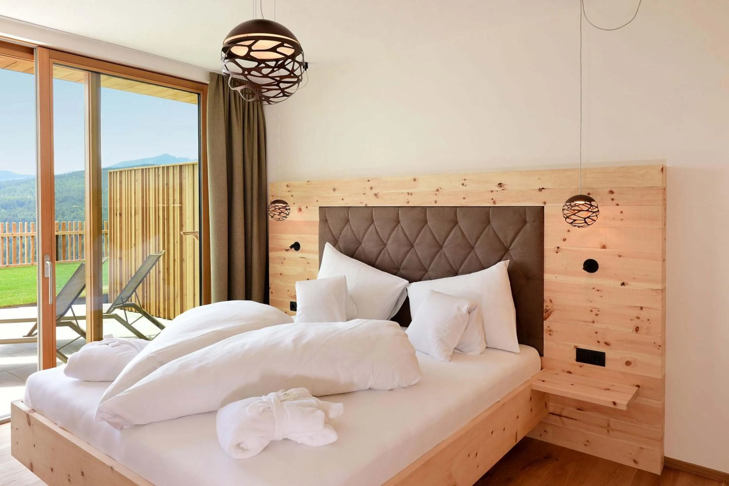 Bed in Tratterhof Mountain Sky Hotel