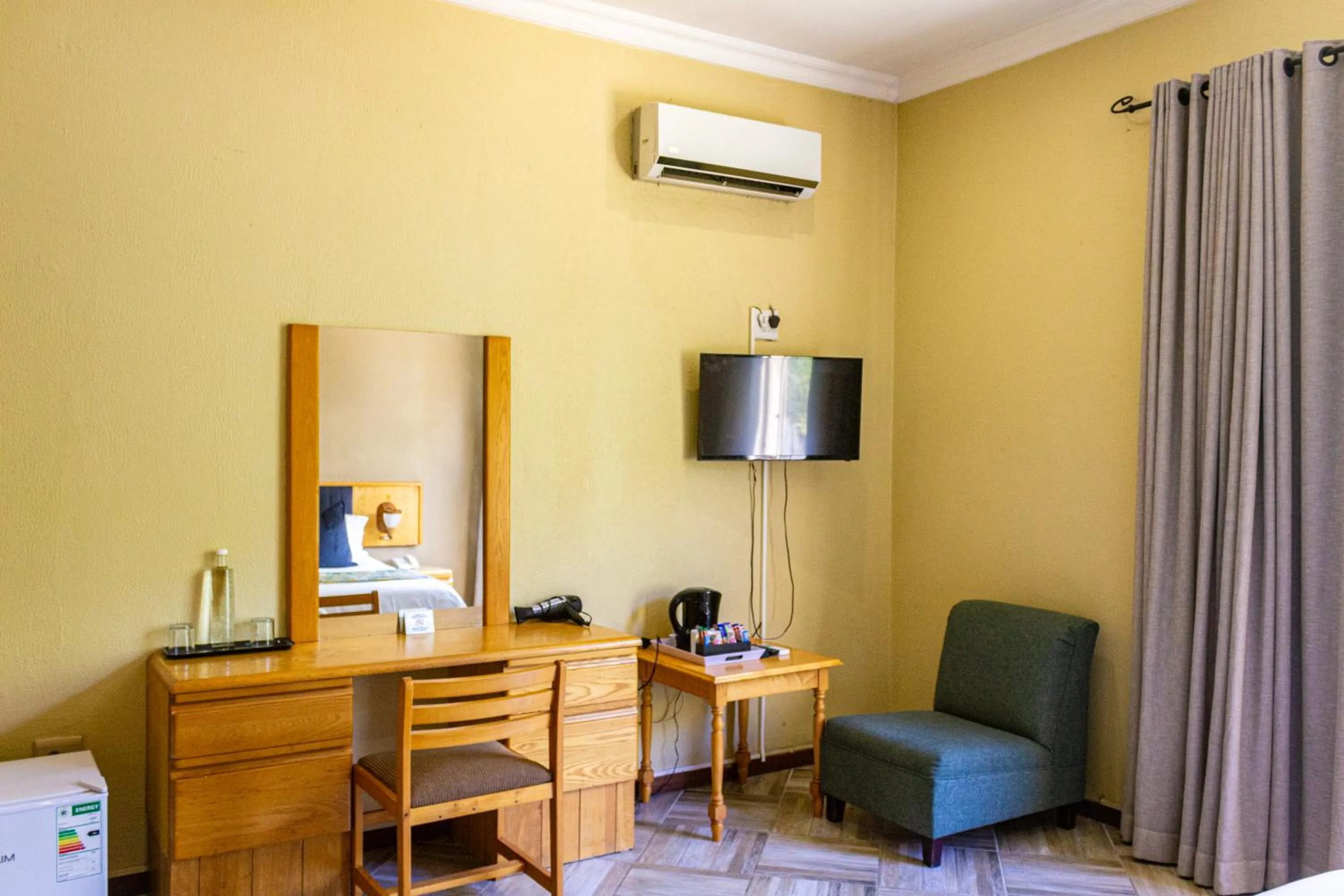 Seating area in Hotel Numbi & Garden Suites