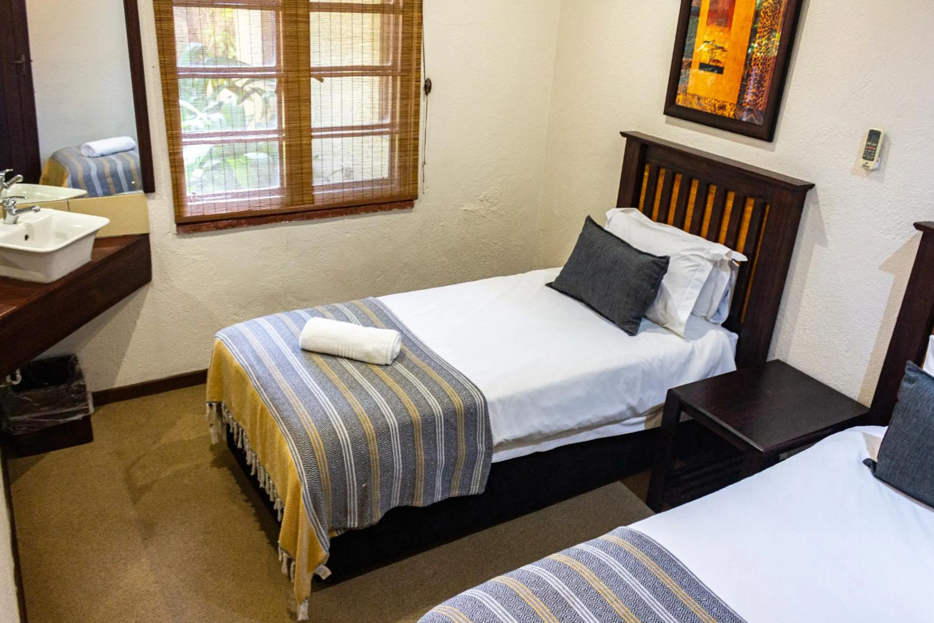 Bedroom, Bed in Hotel Numbi & Garden Suites