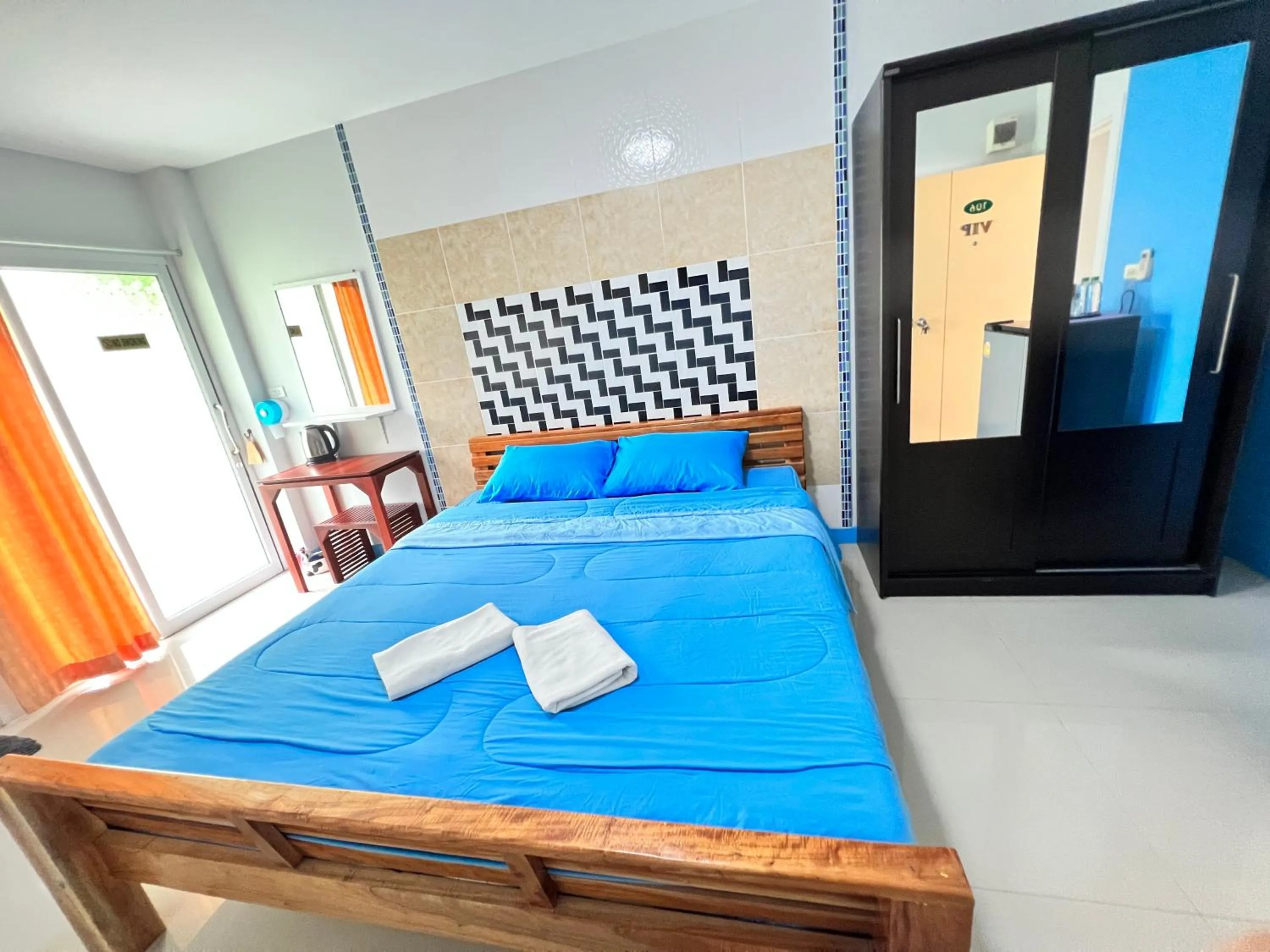 Bed in S Diamond Apartment