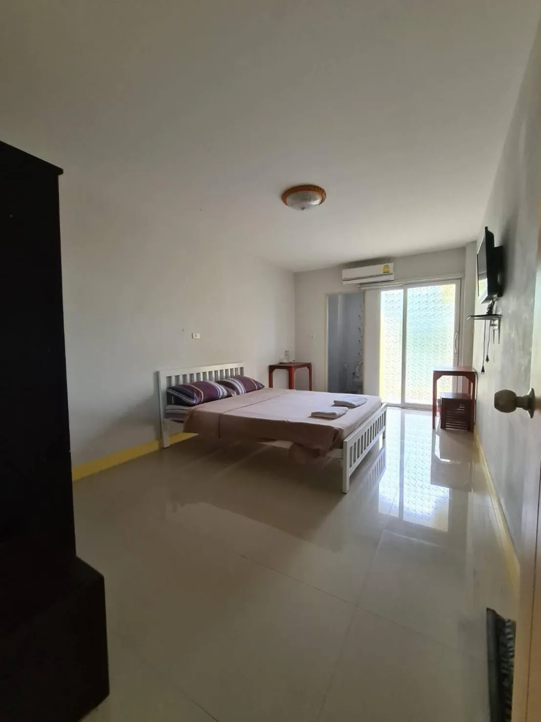 Bed in S Diamond Apartment