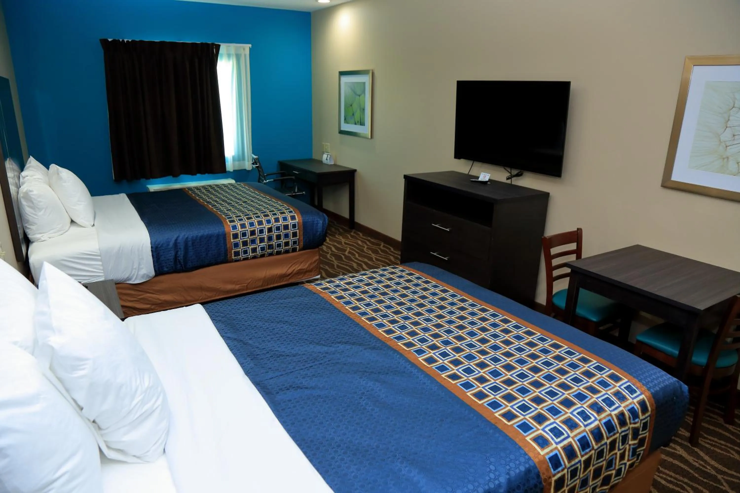 Bed in Americas Best Value Inn & Suites-Prairieville