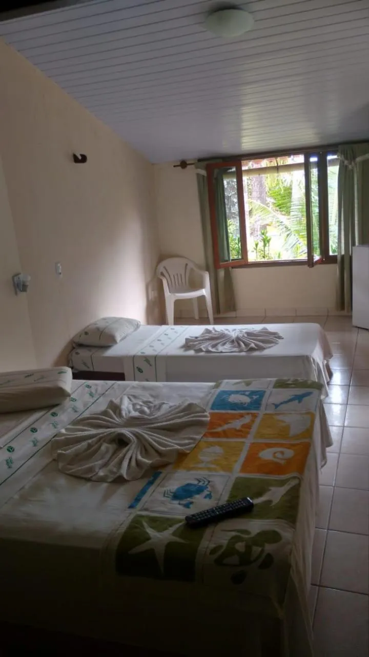 Bed in Hotel Tubarão