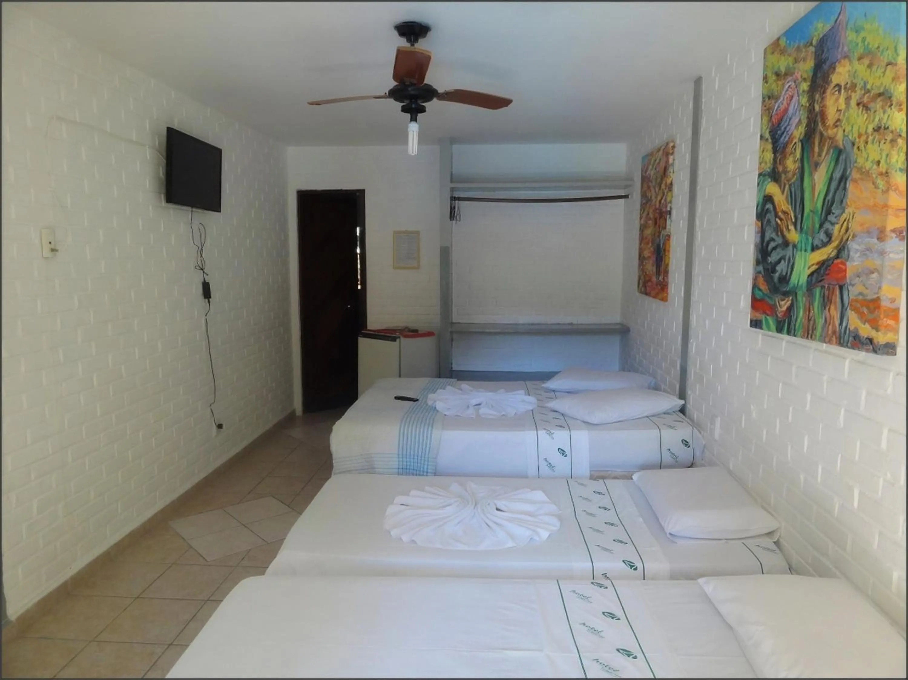 Bed in Hotel Tubarão