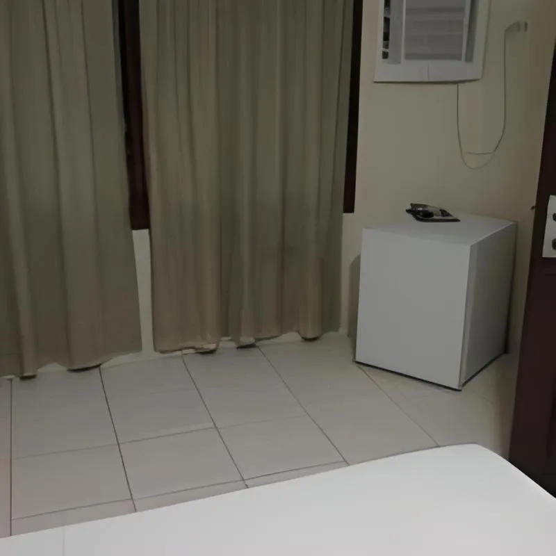 Bed in Hotel Tubarão