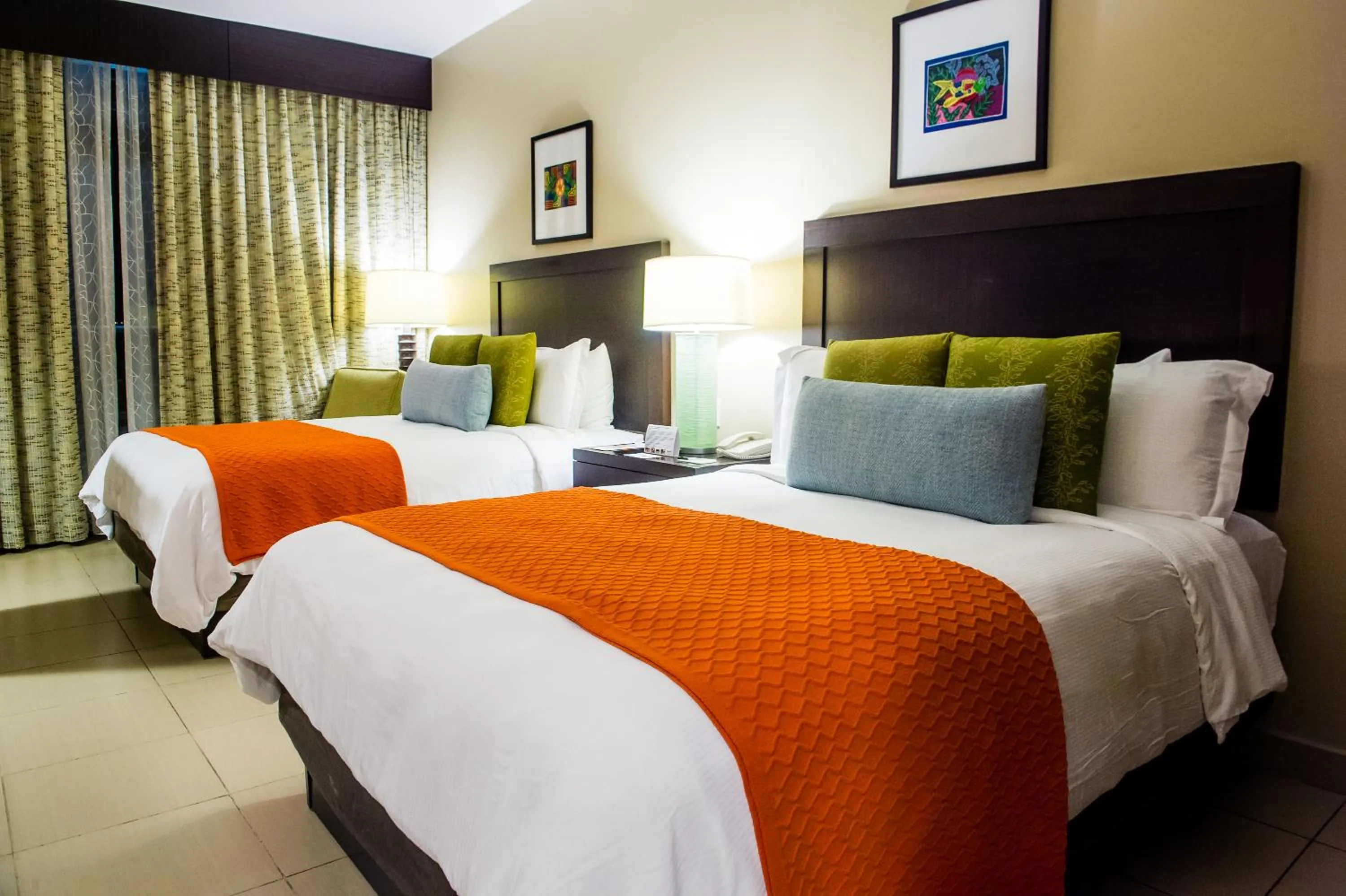 Bed in Summit Rainforest Golf Resort & All Inclusive