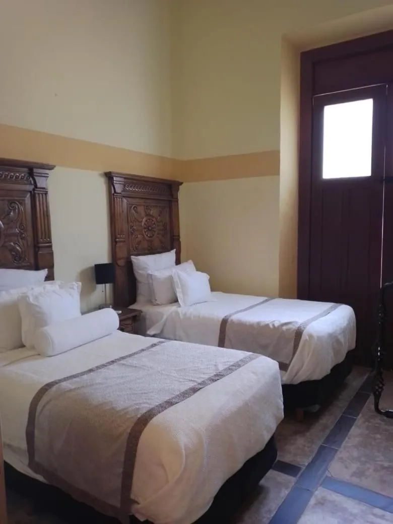 Bed in Hacienda Santa Cruz Merida