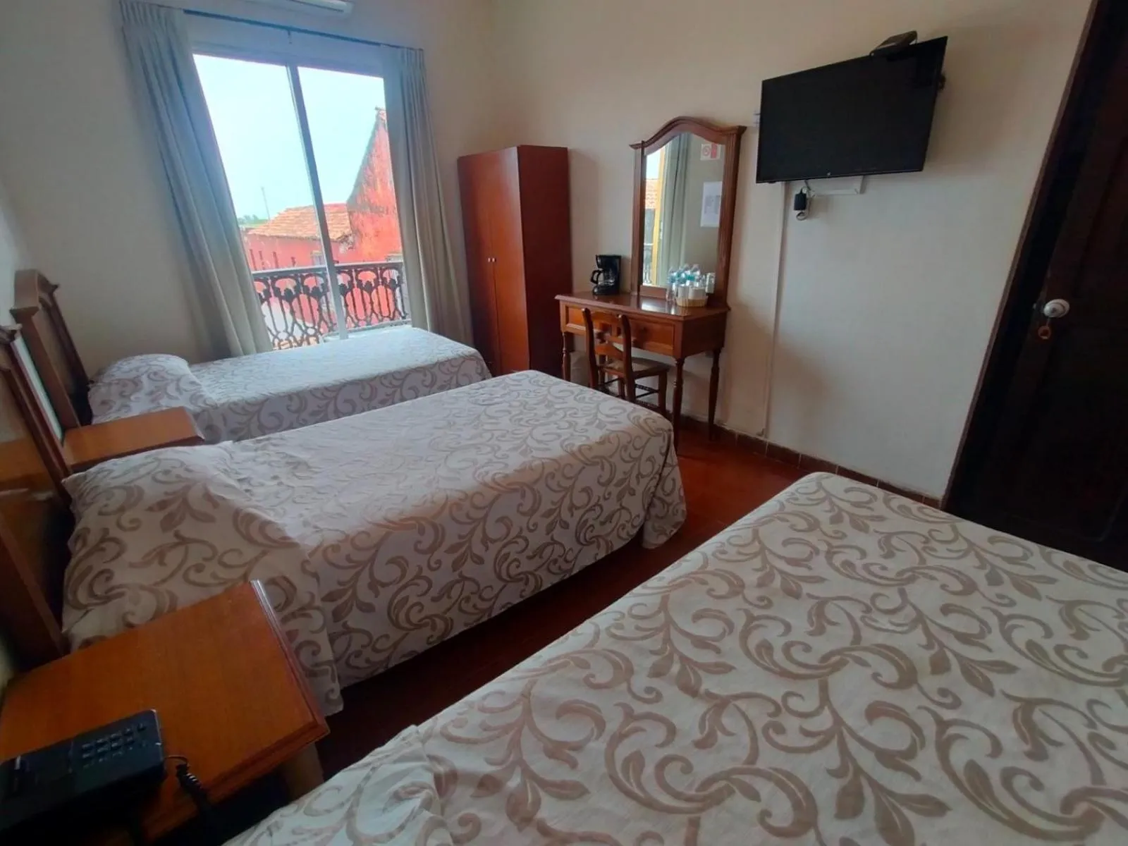 Bed in Hotel Posada Doña Lala