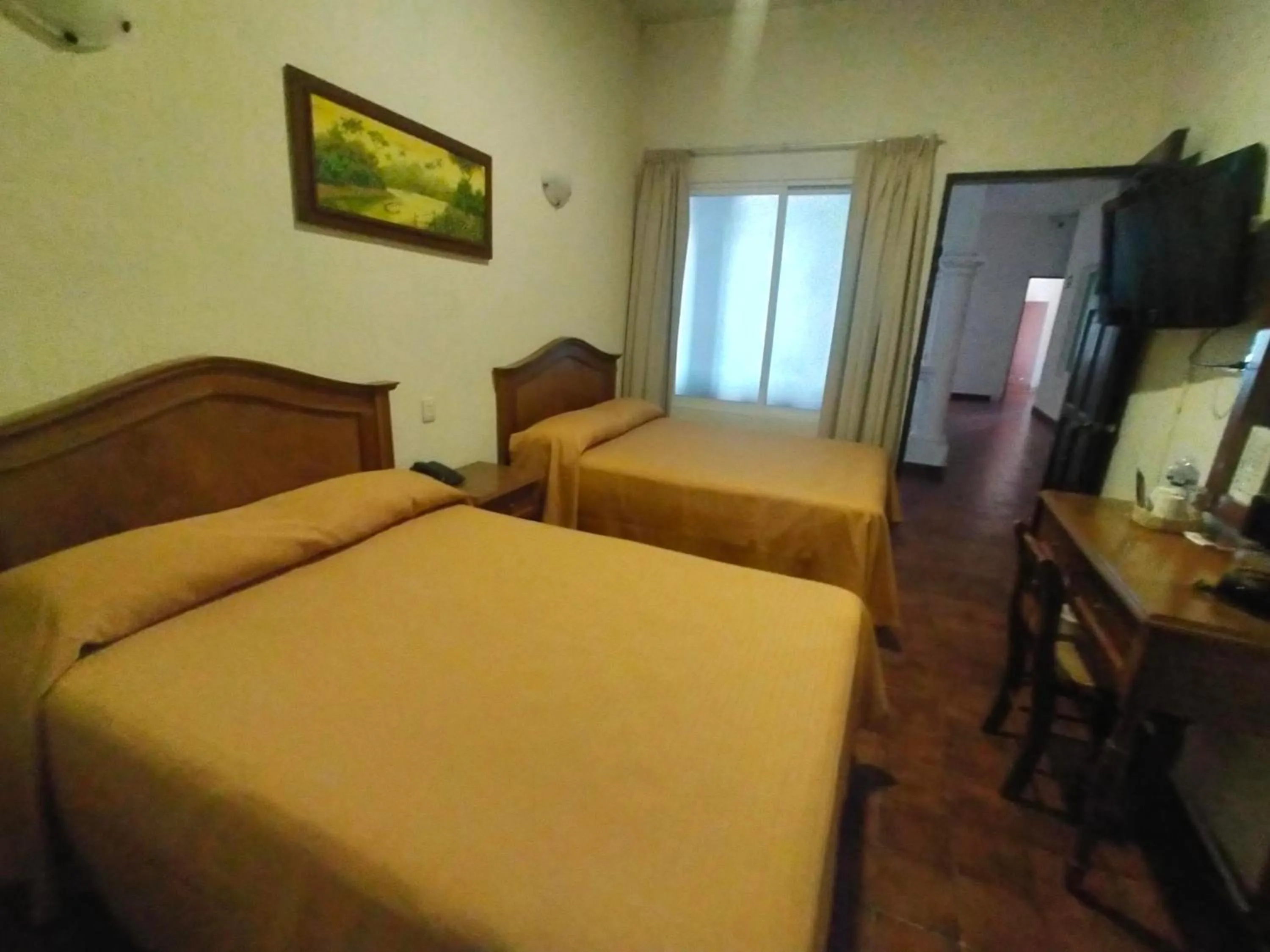 Bed in Hotel Posada Doña Lala