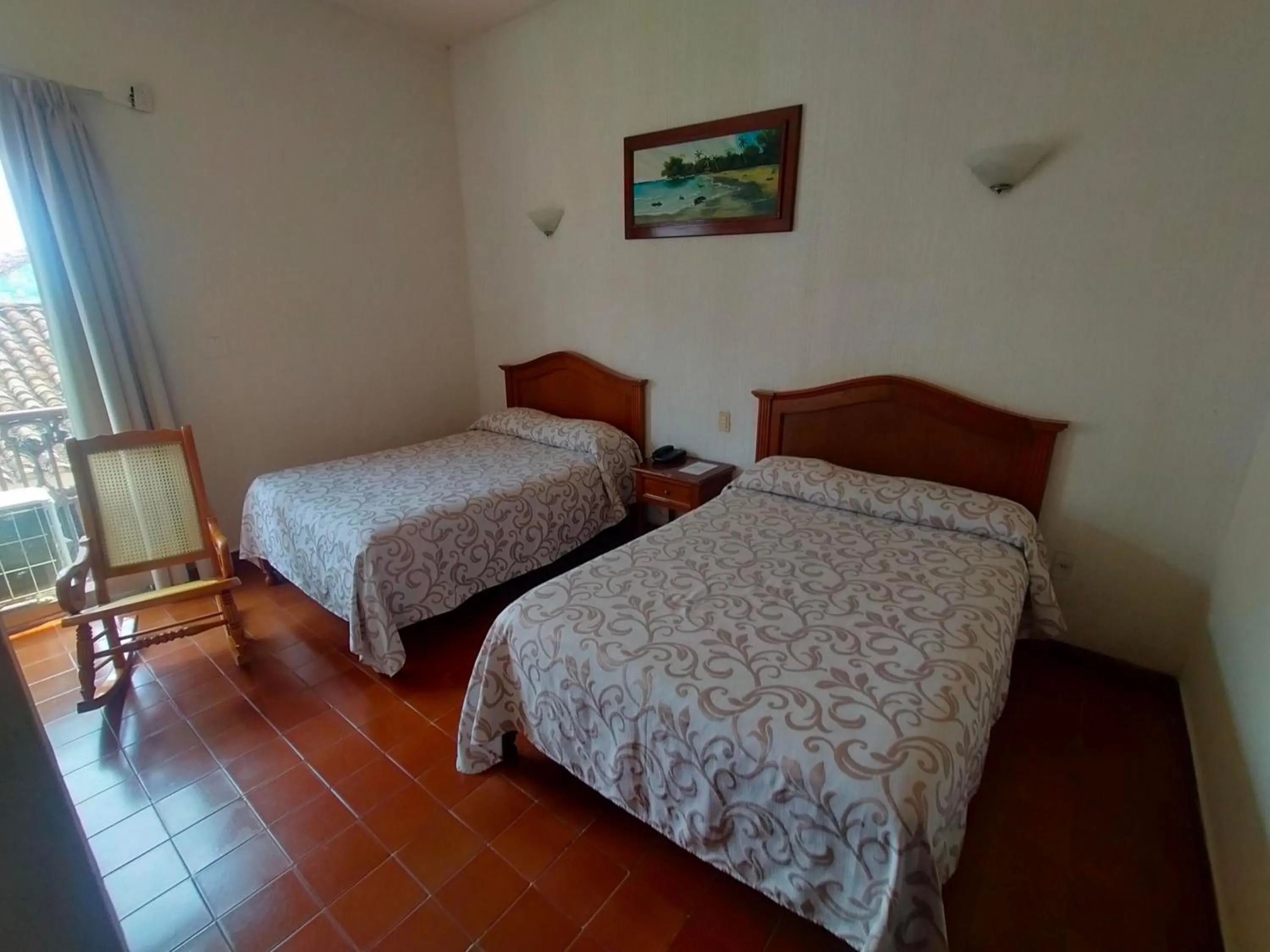 Bed in Hotel Posada Doña Lala