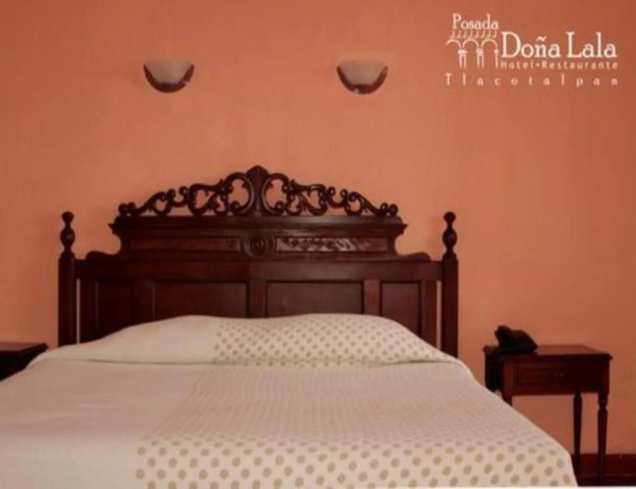 Bed in Hotel Posada Doña Lala