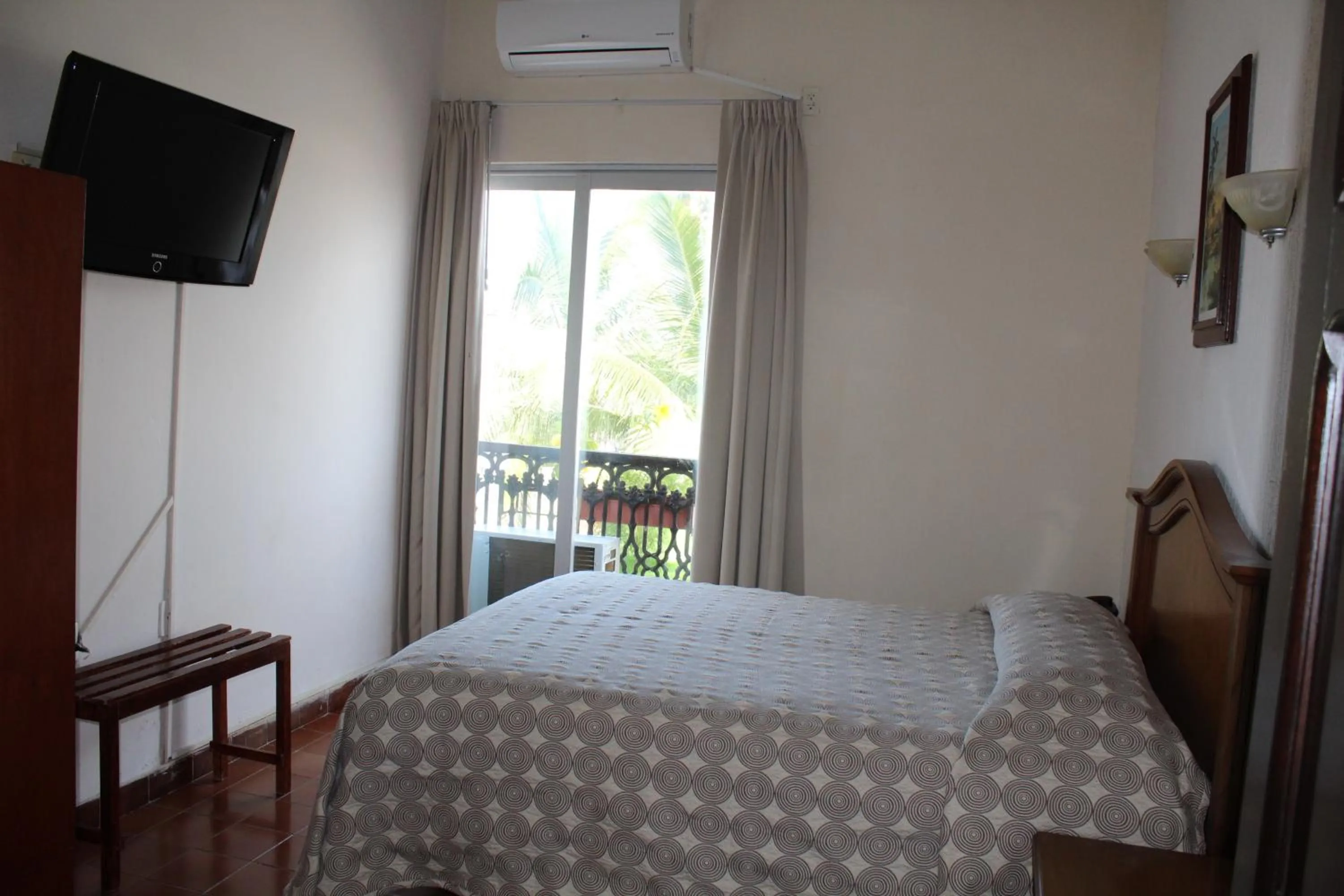 Bed in Hotel Posada Doña Lala