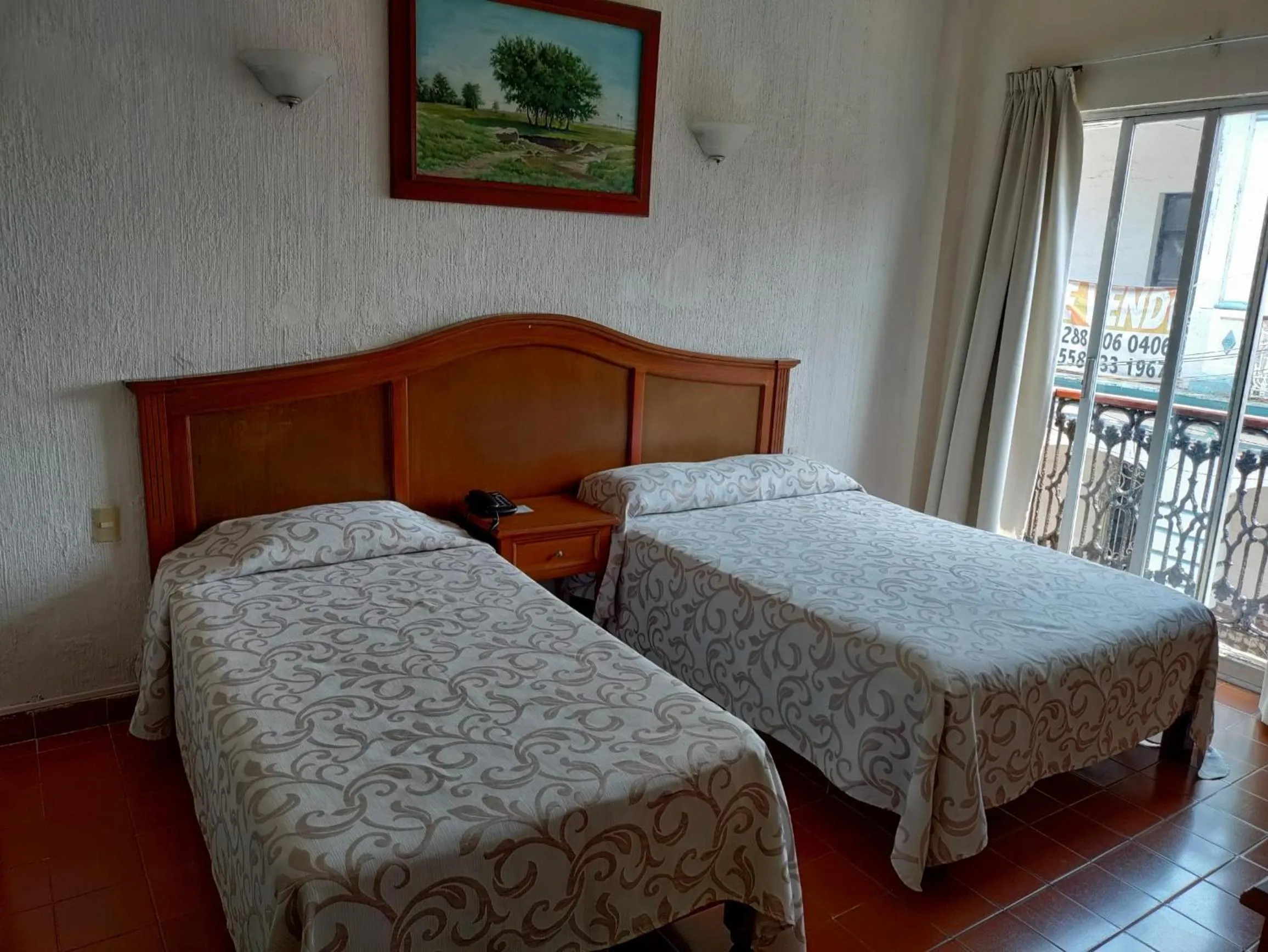 Bed in Hotel Posada Doña Lala