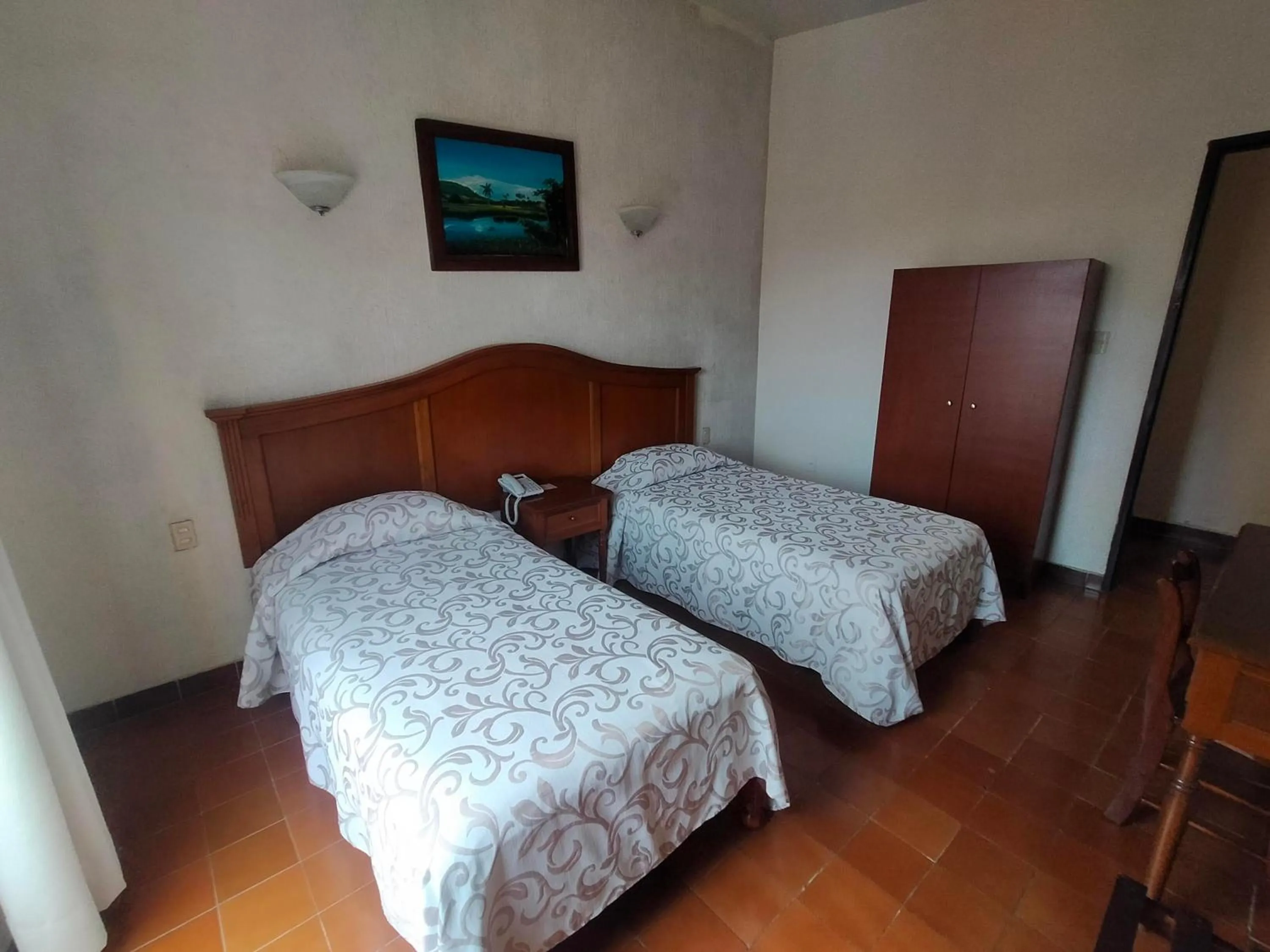 Bed in Hotel Posada Doña Lala