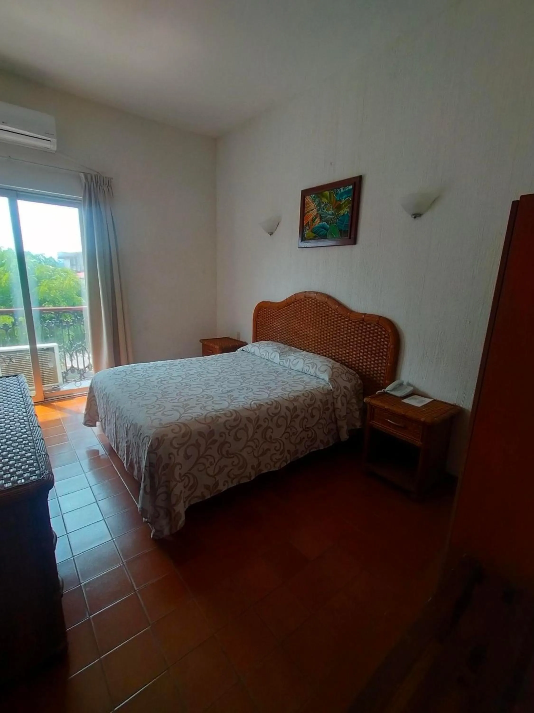 Bed in Hotel Posada Doña Lala