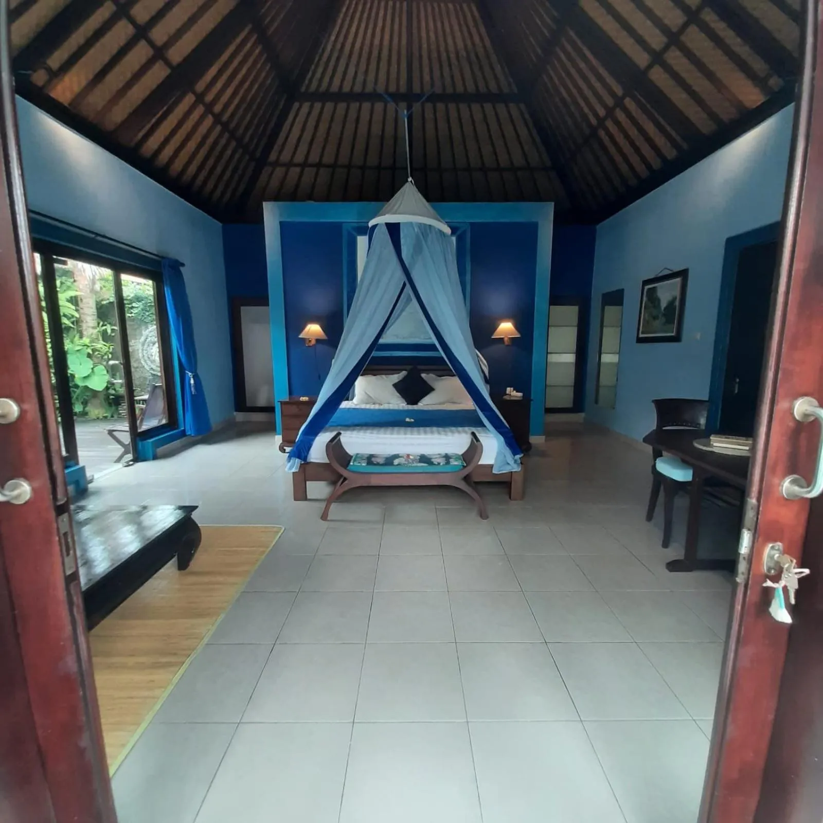Bed in Villa Shantitara Bungalows