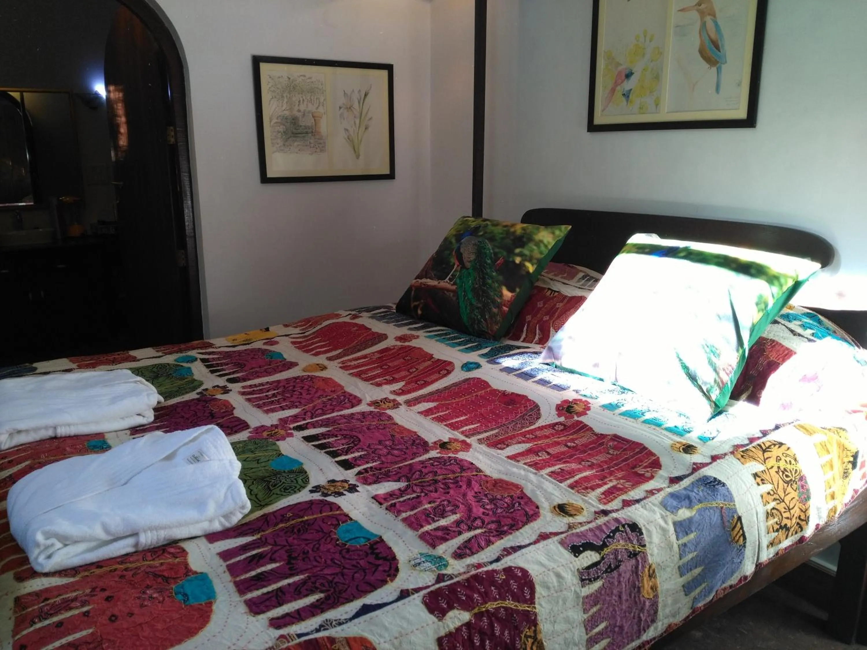 Bed in Samira's Birds & Butterflies Park-Spashram Ganga Beach Retreat