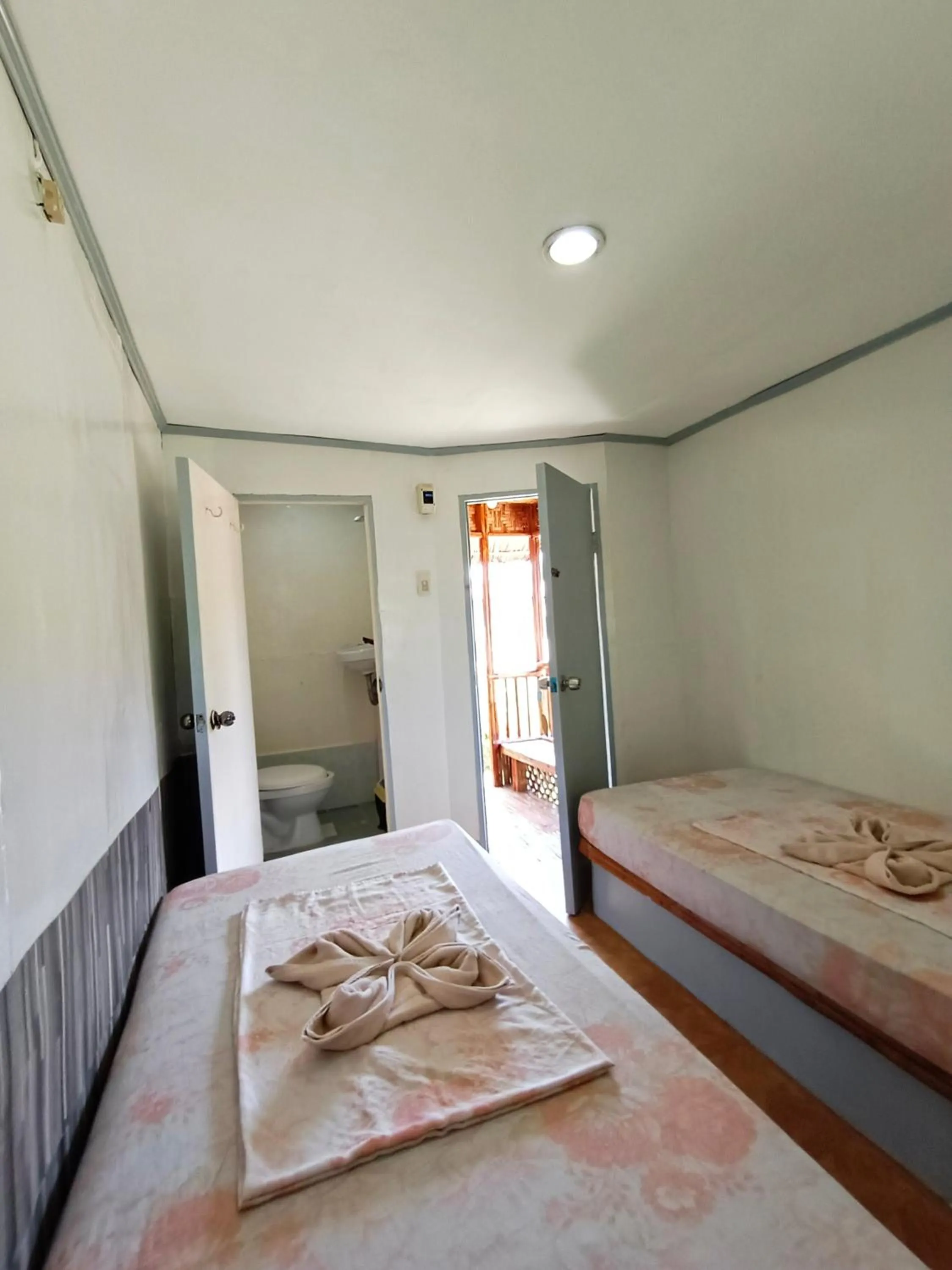 Bed in Ander Divers Garden Resort