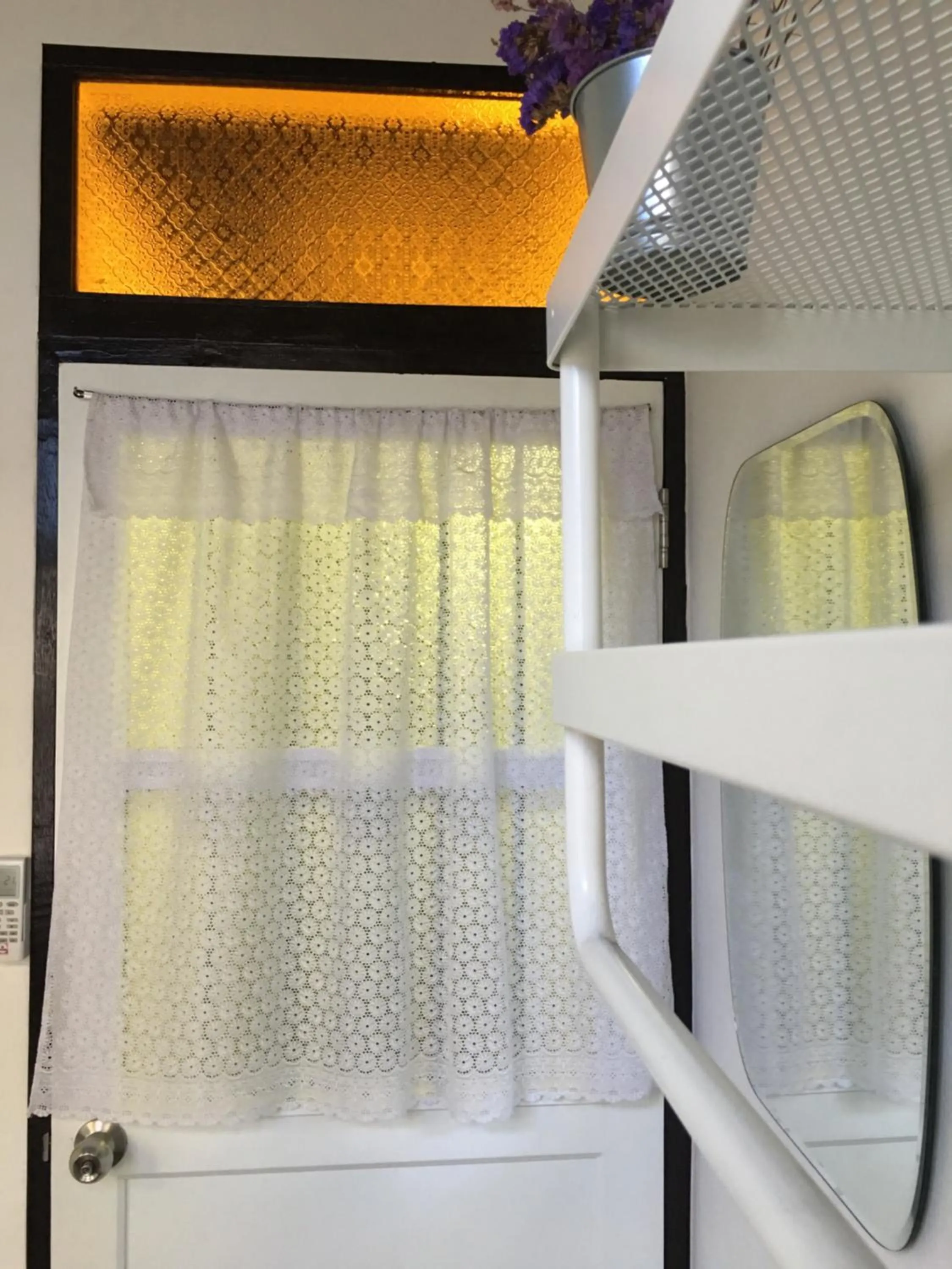 Decorative detail in Bangkok Sanookdee Hostel