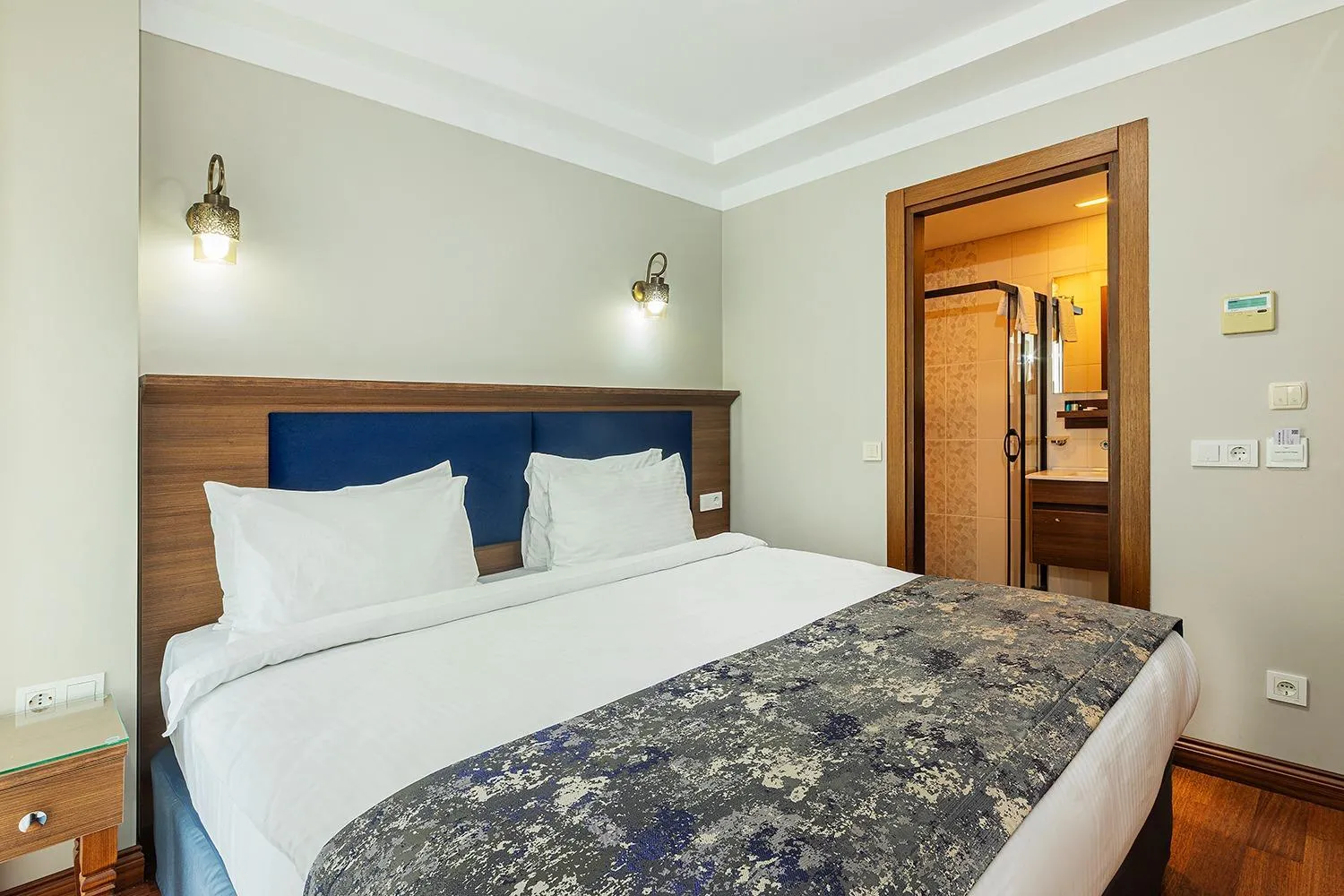 Bed in Aristocrat Hotel