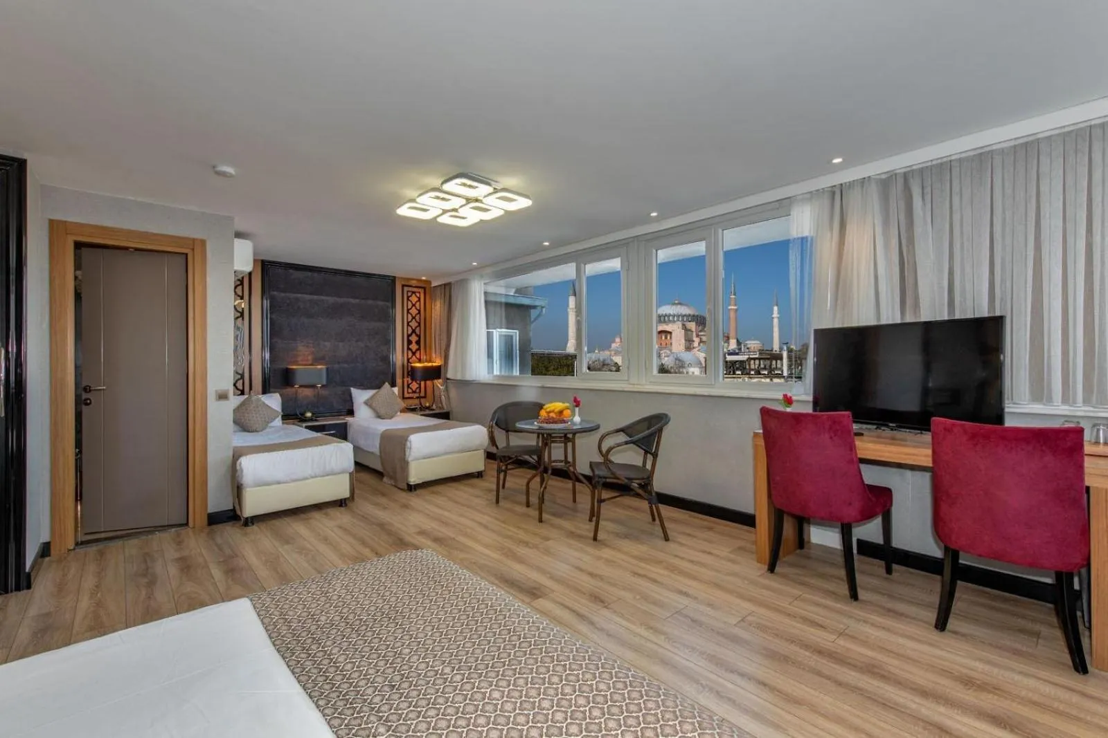 Bed in Aristocrat Hotel