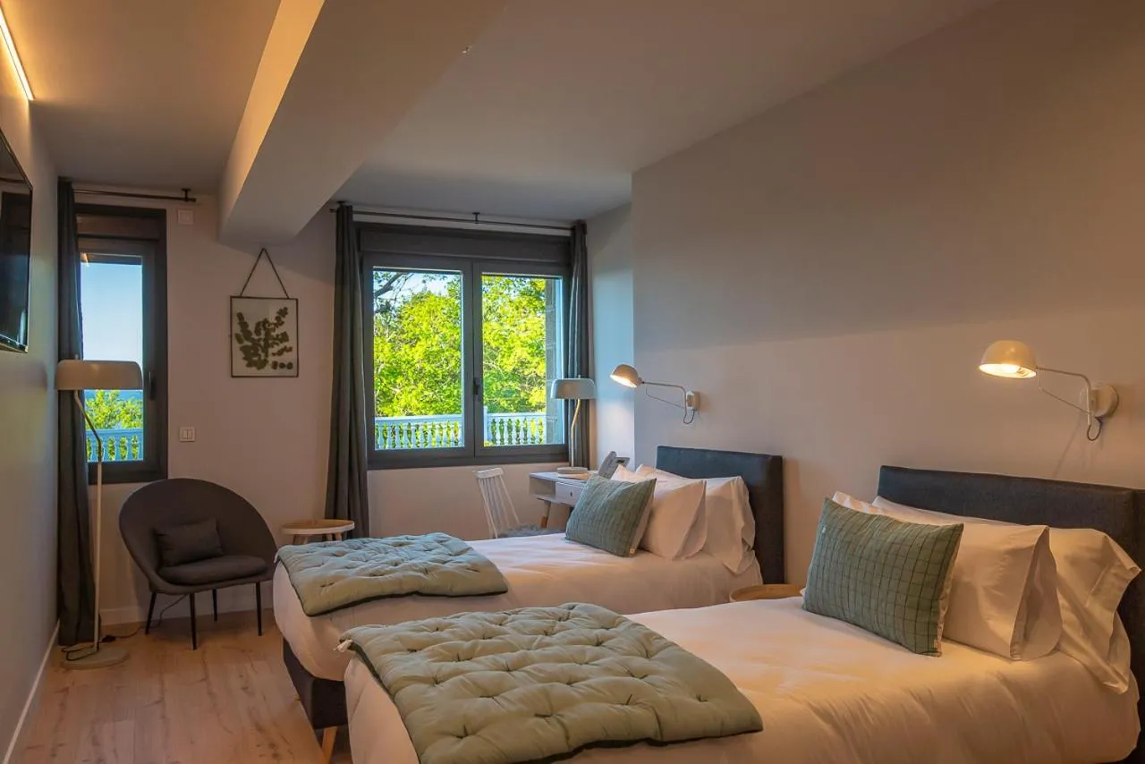 Photo of the whole room, Bed in IXUA Hotela