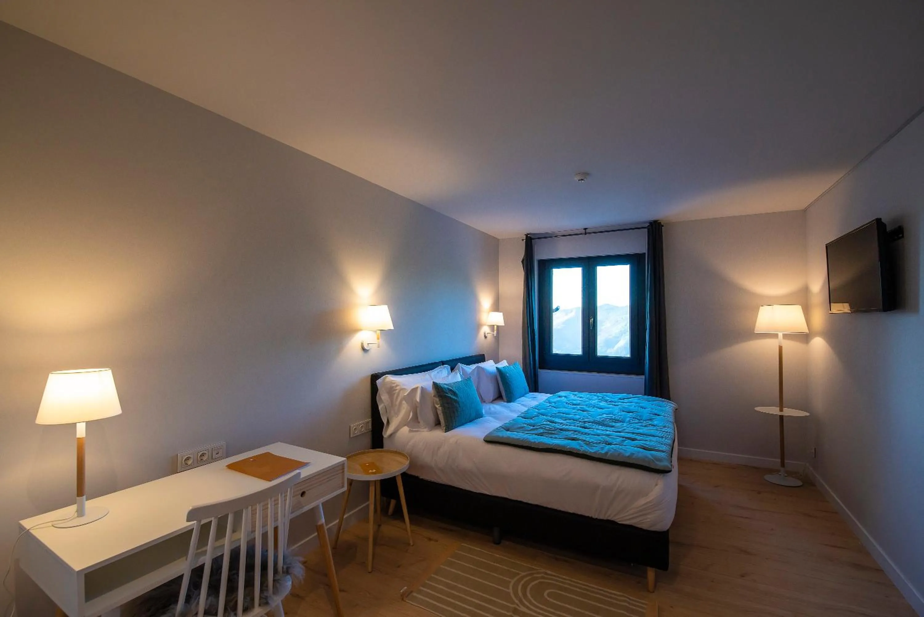 Photo of the whole room, Bed in IXUA Hotela