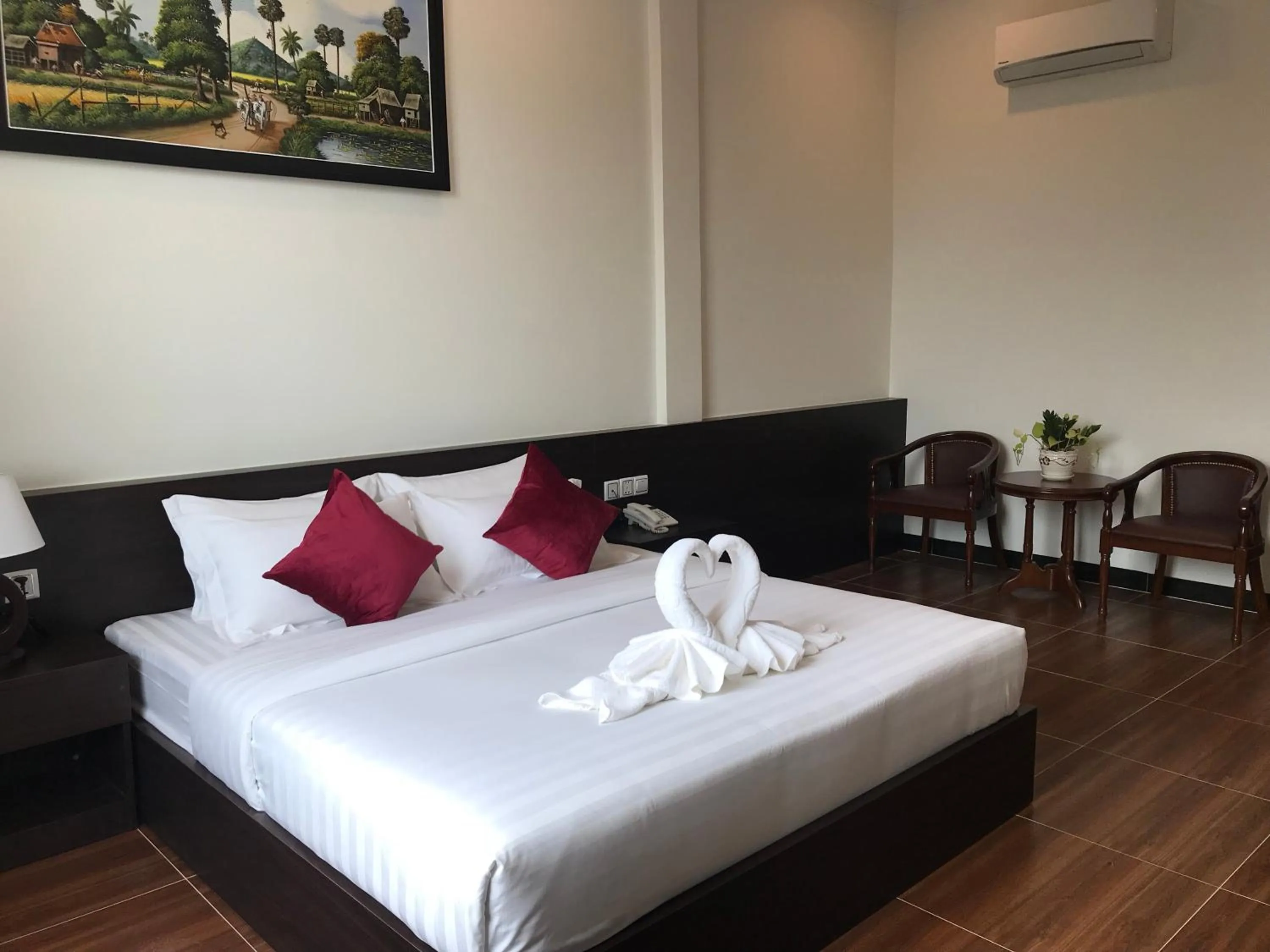 Photo of the whole room, Bed in Apple Hotel Two - Near Phnom Penh Airport