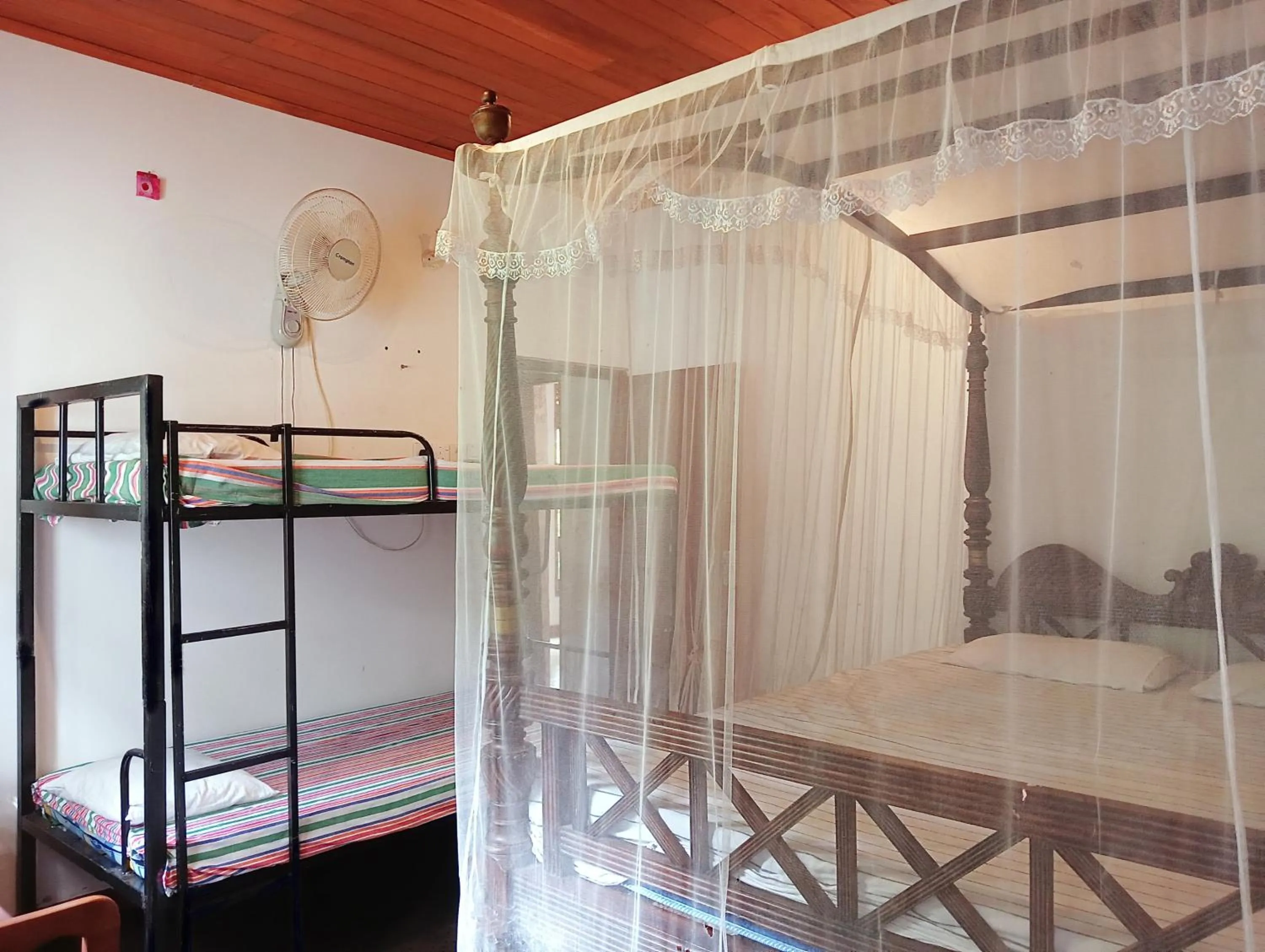 Bed in Green Herbal Ayurvedic Eco-Lodge