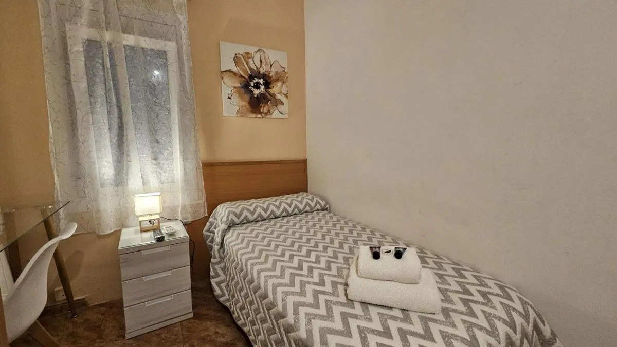 Bed in Hostal Rio De Castro