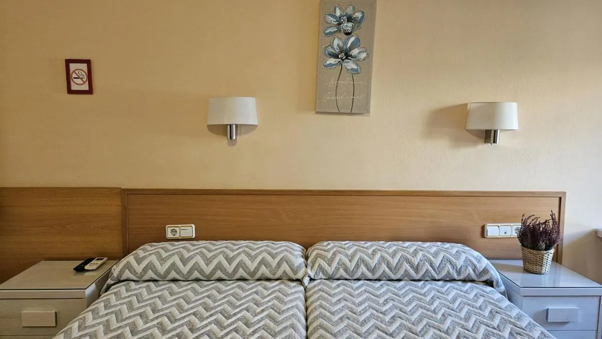 Bed in Hostal Rio De Castro