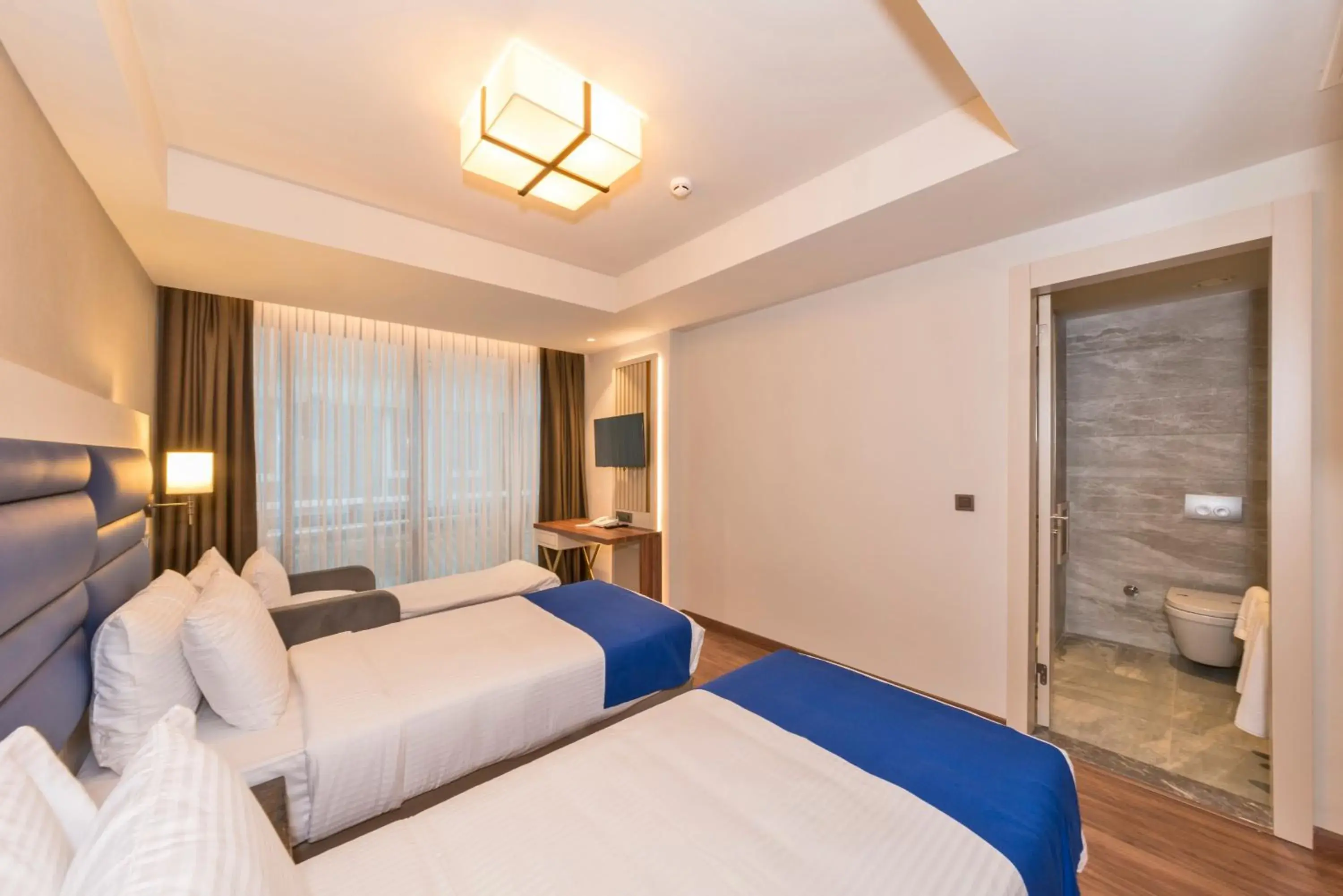 Deluxe Triple Room in Golden Royal Hotel & SPA Deluxe Triple Room in Golden Royal Hotel & SPA