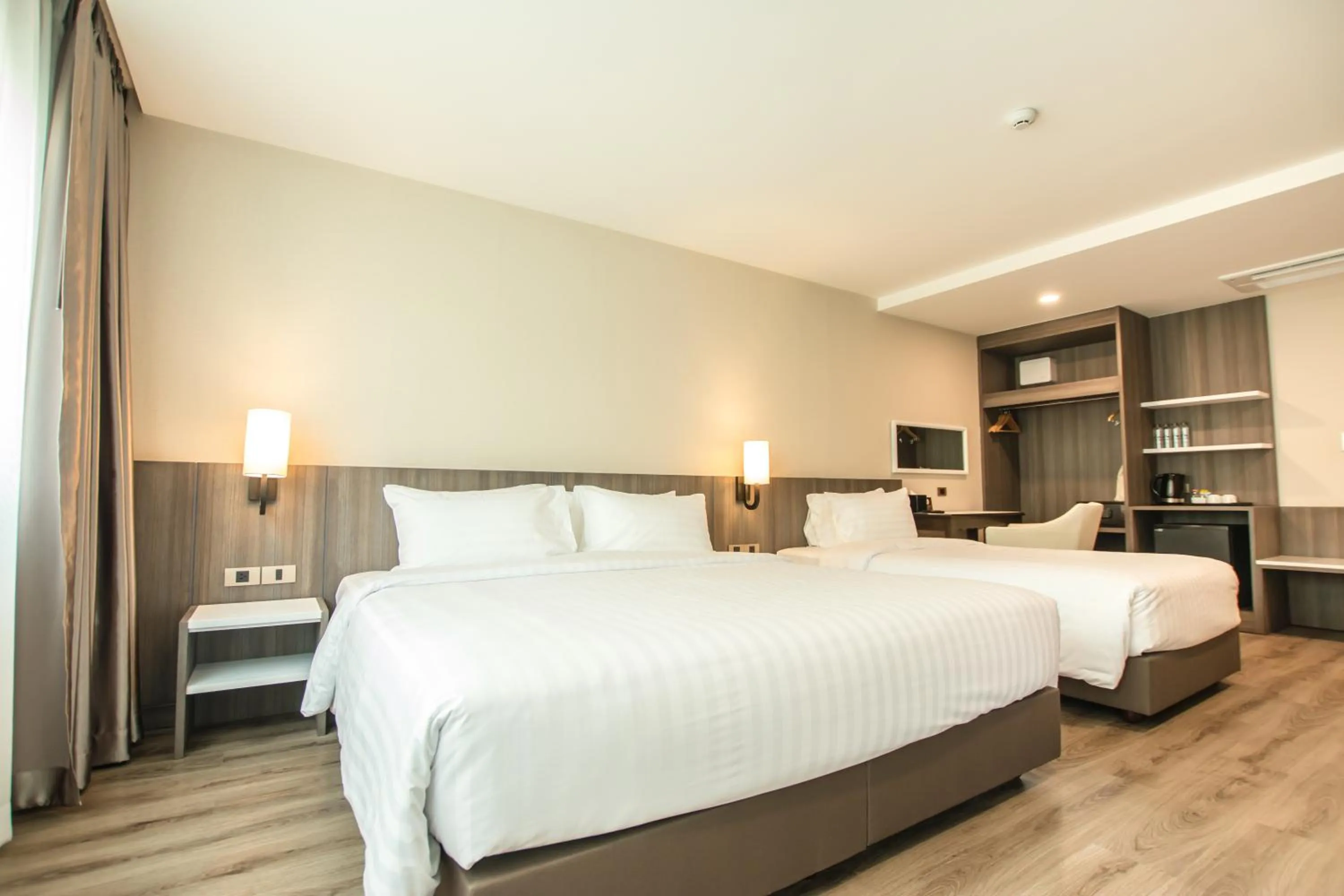 Bed in Hotel MAYU Chiang Mai