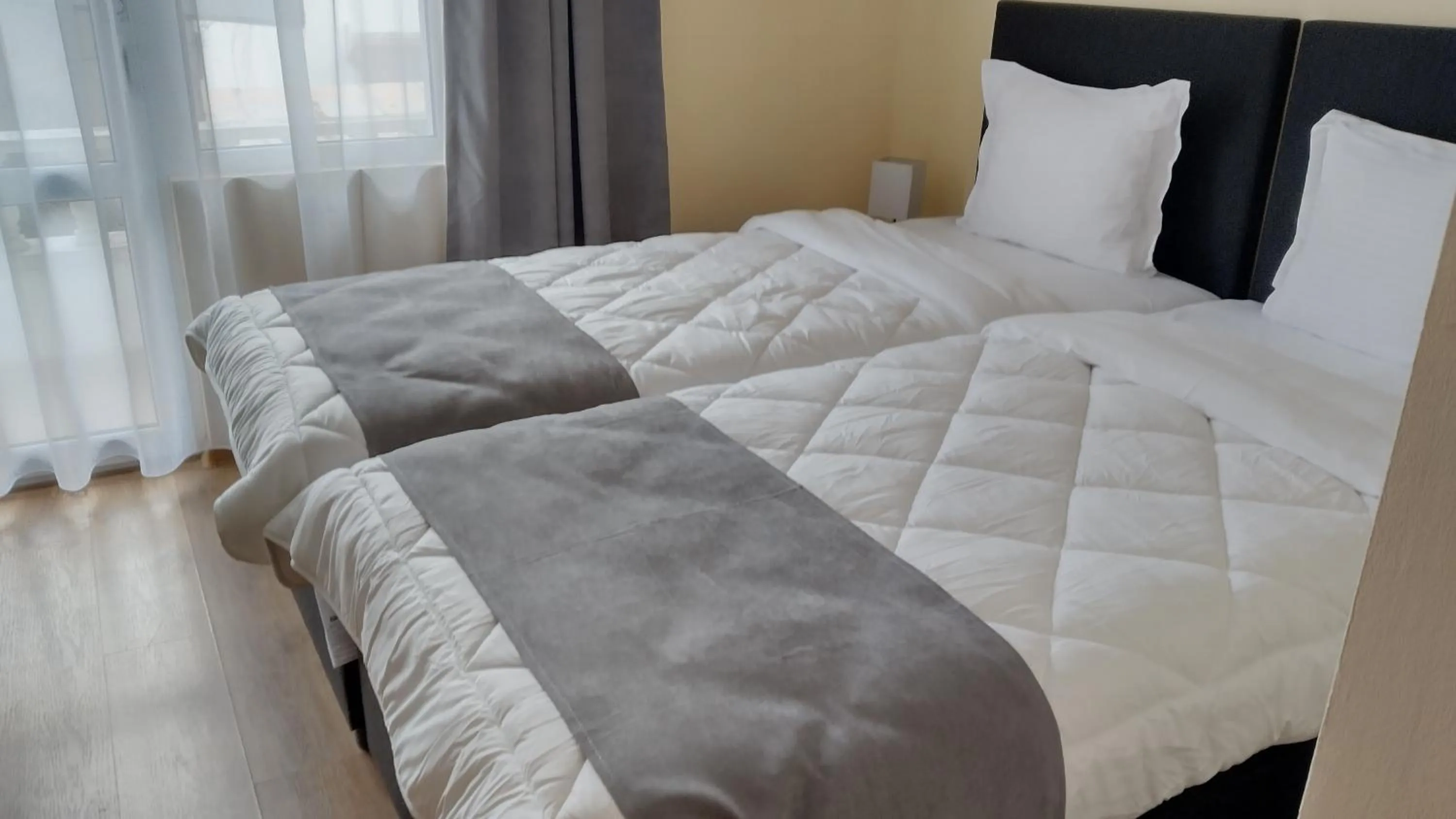 Seating area, Bed in Victoria Family Hotel