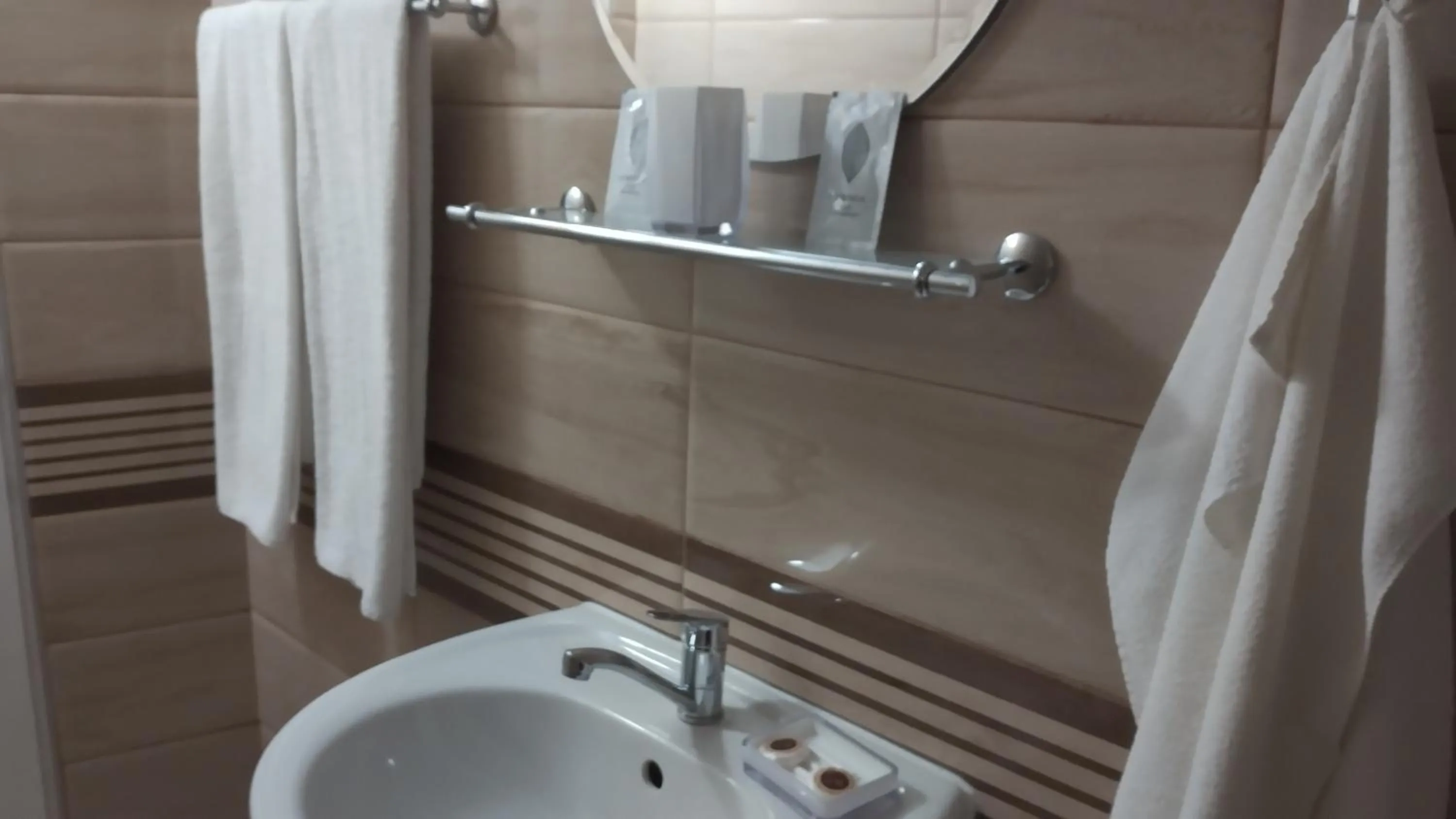 Bathroom in Victoria Family Hotel