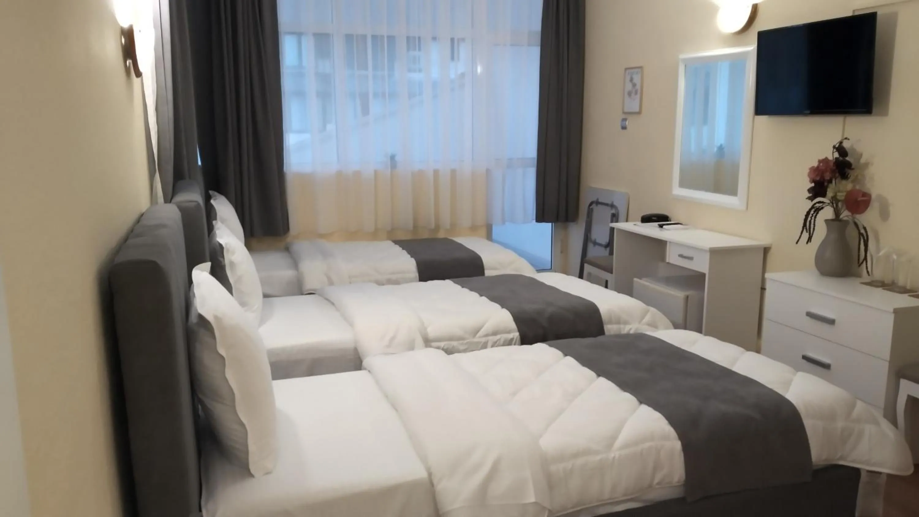 Bed in Victoria Family Hotel