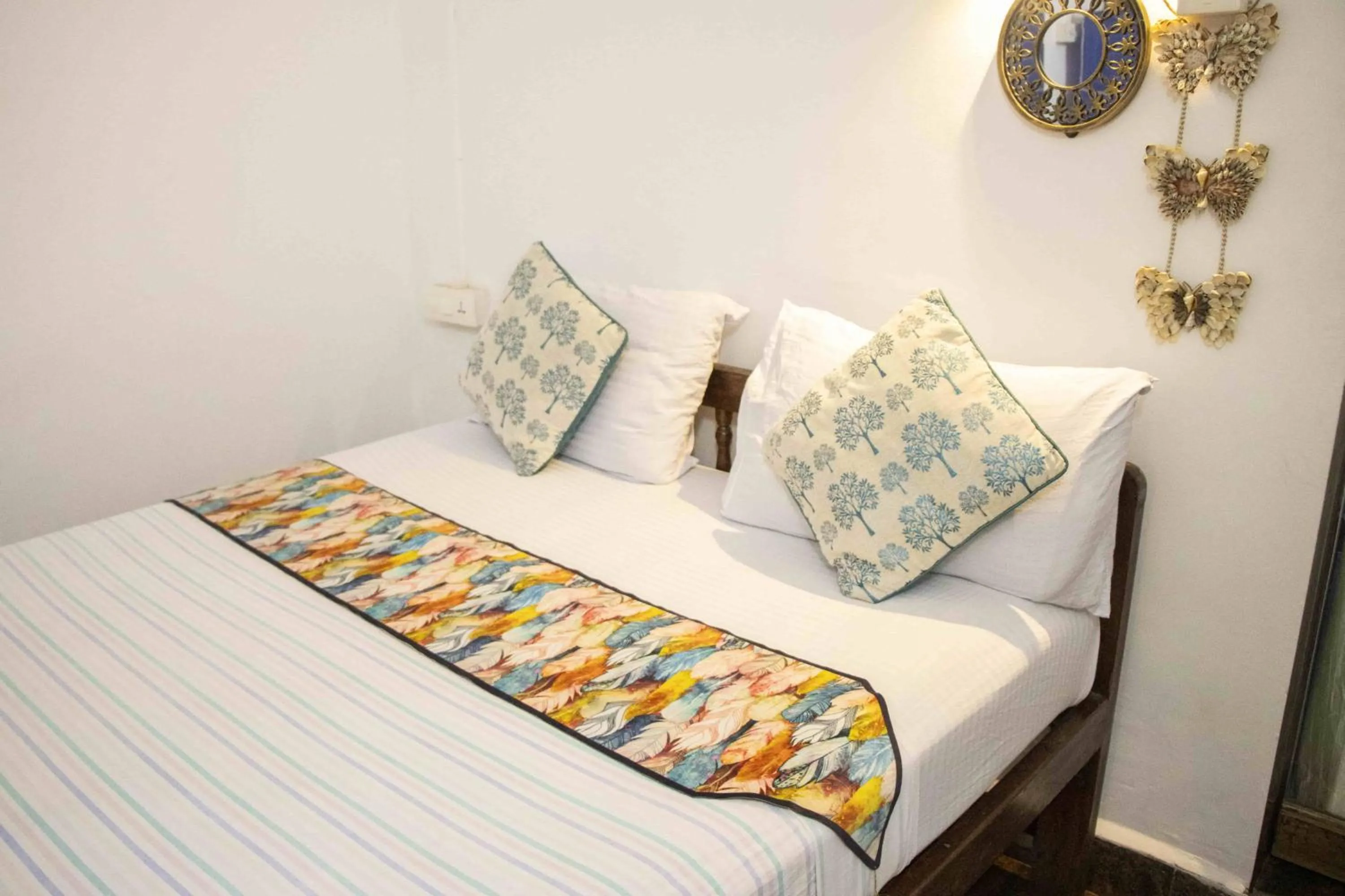 Bed in Secret Garden Agonda Beach Resort