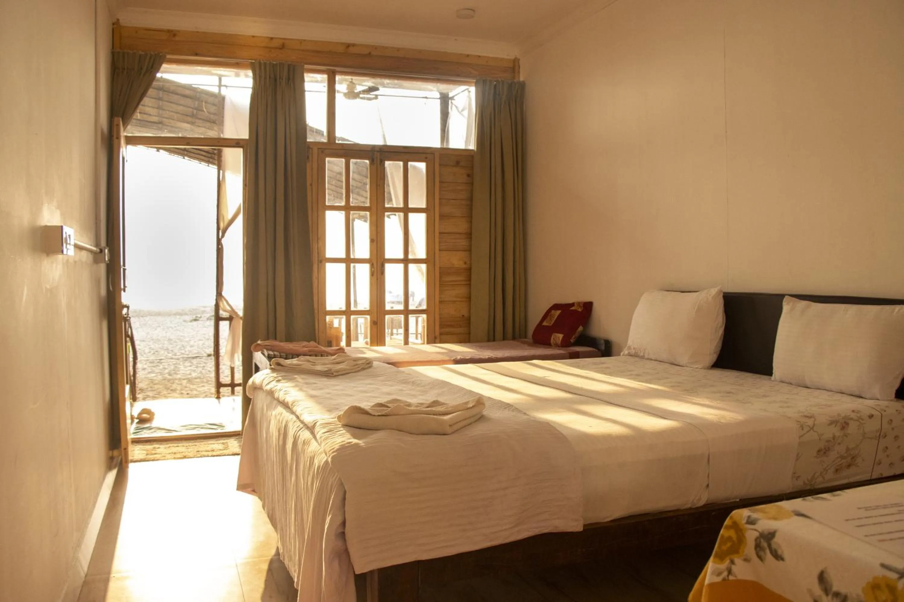 Bed in Secret Garden Agonda Beach Resort