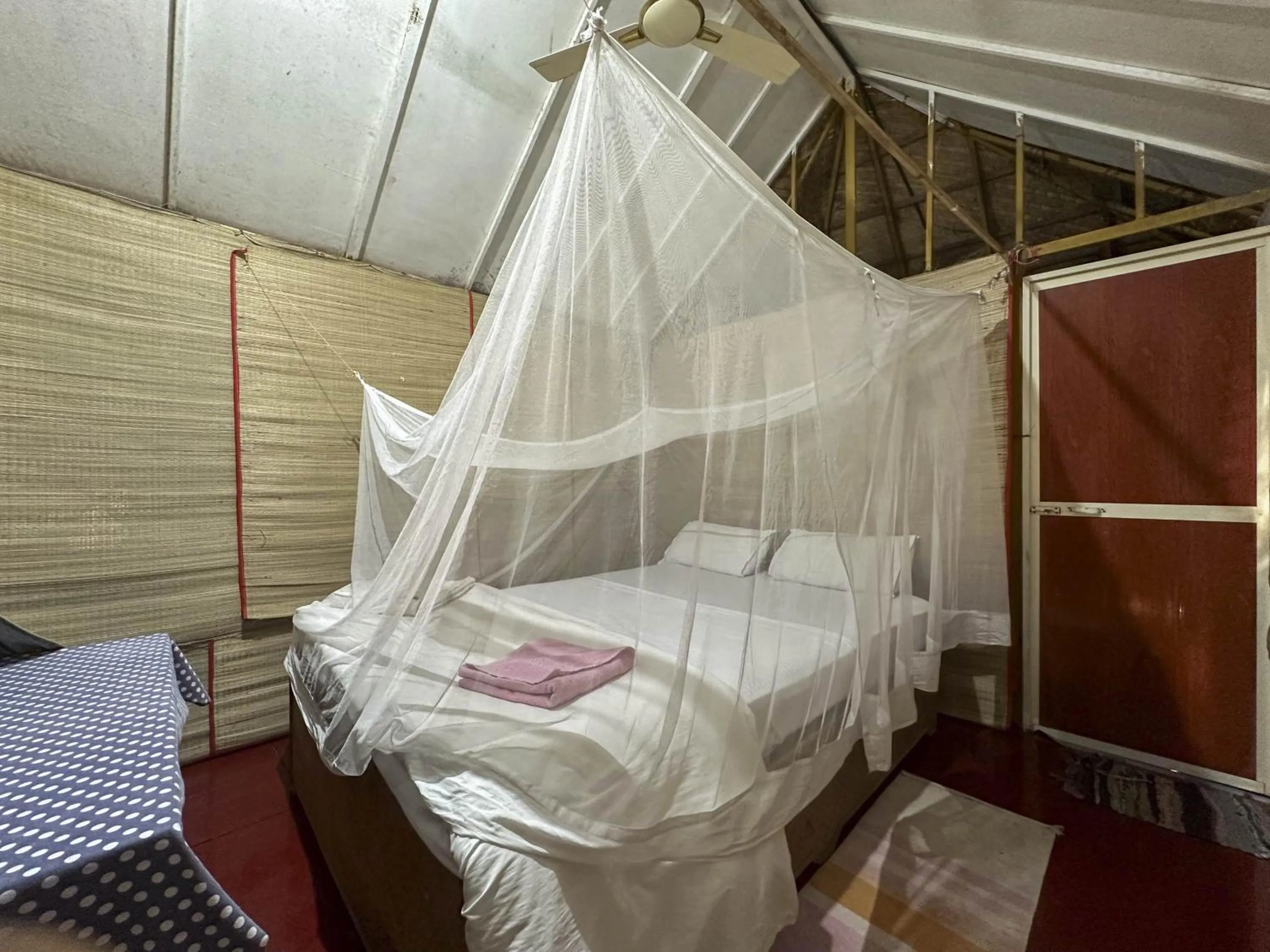 Bed in Secret Garden Agonda Beach Resort