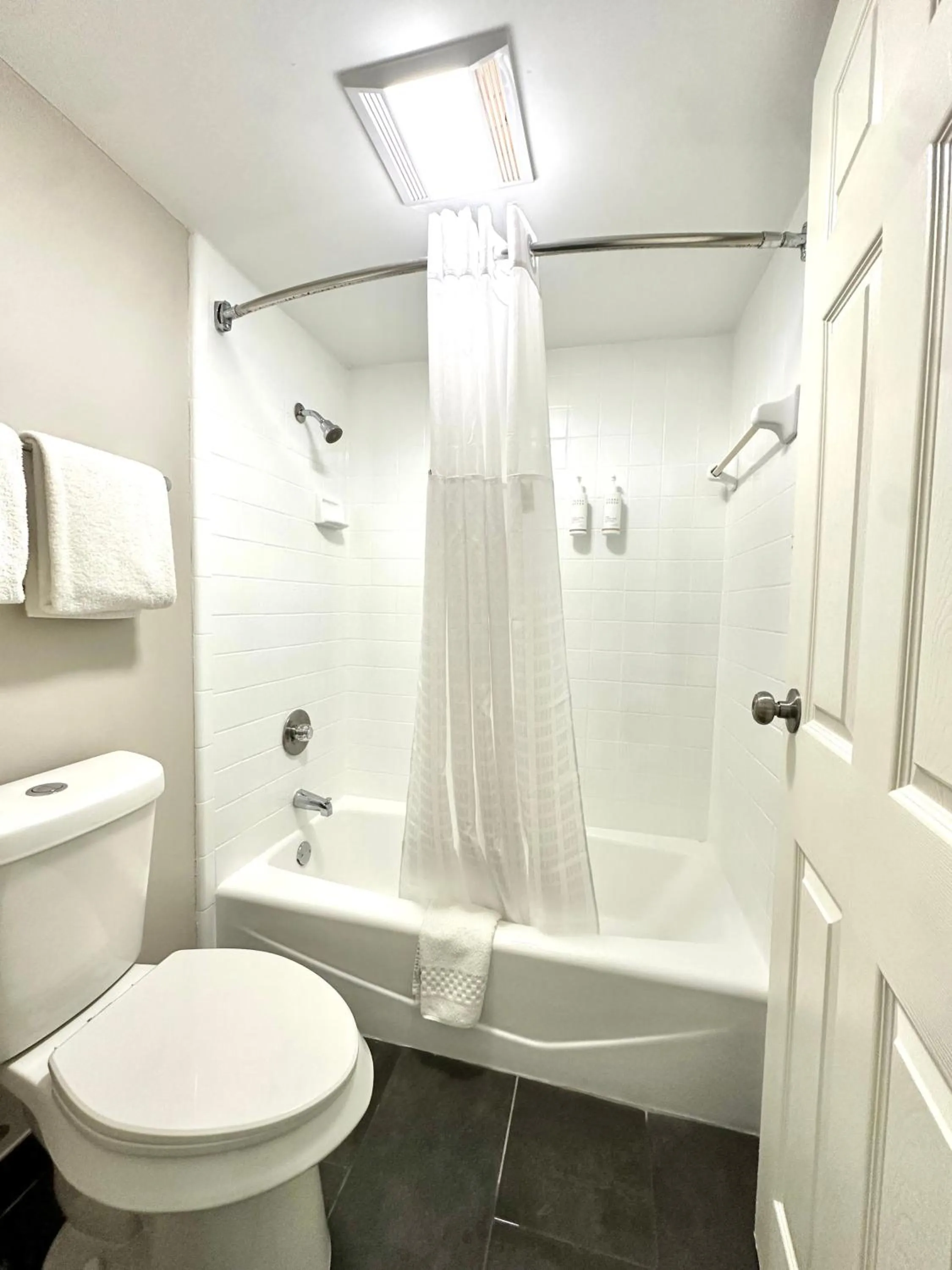 Shower in Days Inn & Suites by Wyndham Bossier City - Casino Area
