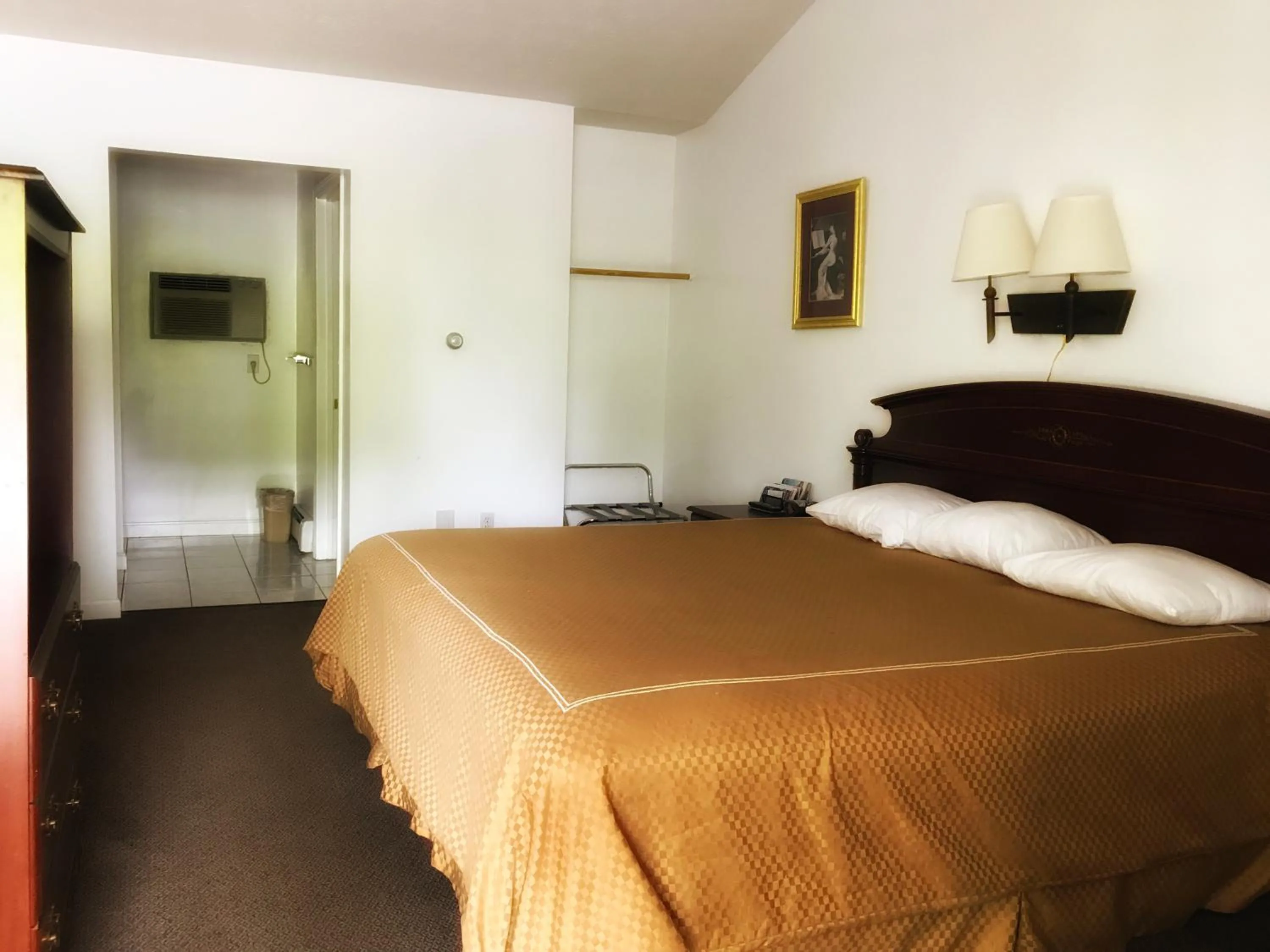 Bed in Exit 5 Resort & Condominium