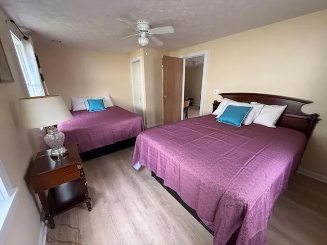 Bed in Exit 5 Resort & Condominium