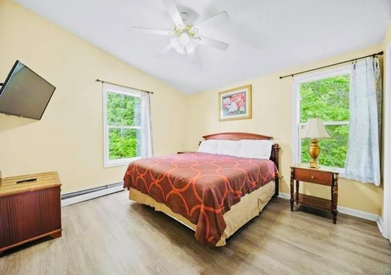 Bed in Exit 5 Resort & Condominium