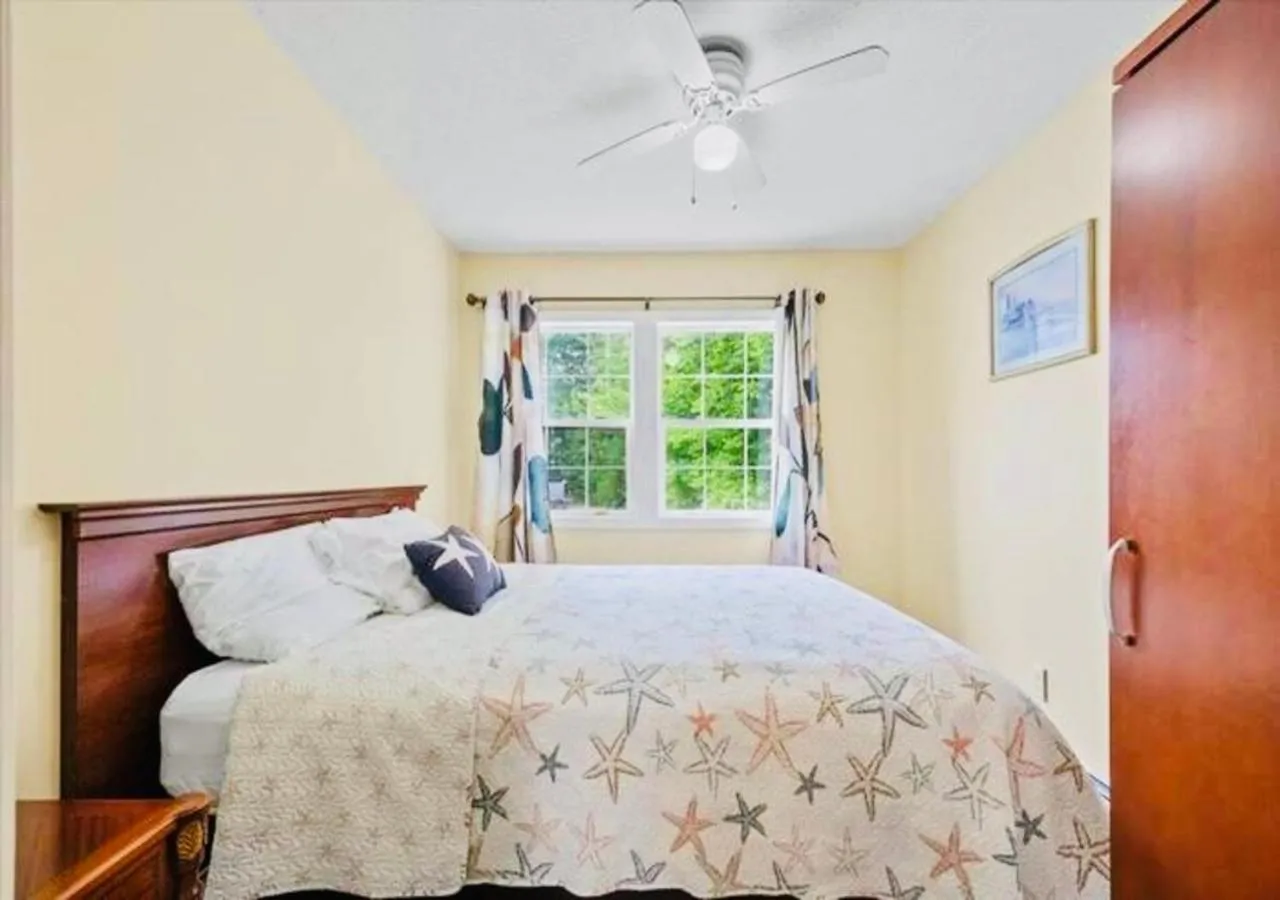 Bed in Exit 5 Resort & Condominium