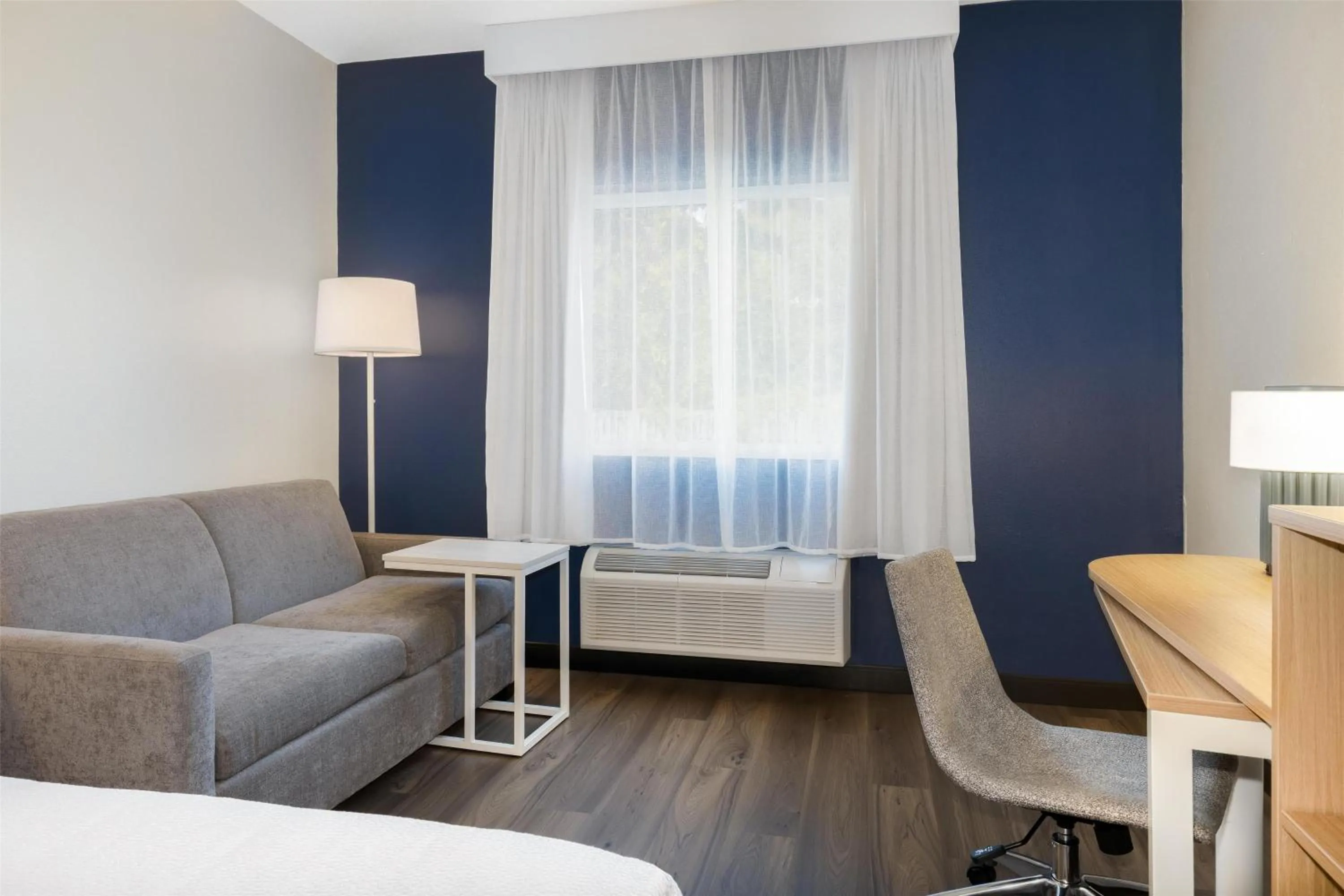 Living room in Spark By Hilton Wilmington Carolina Beach Rd