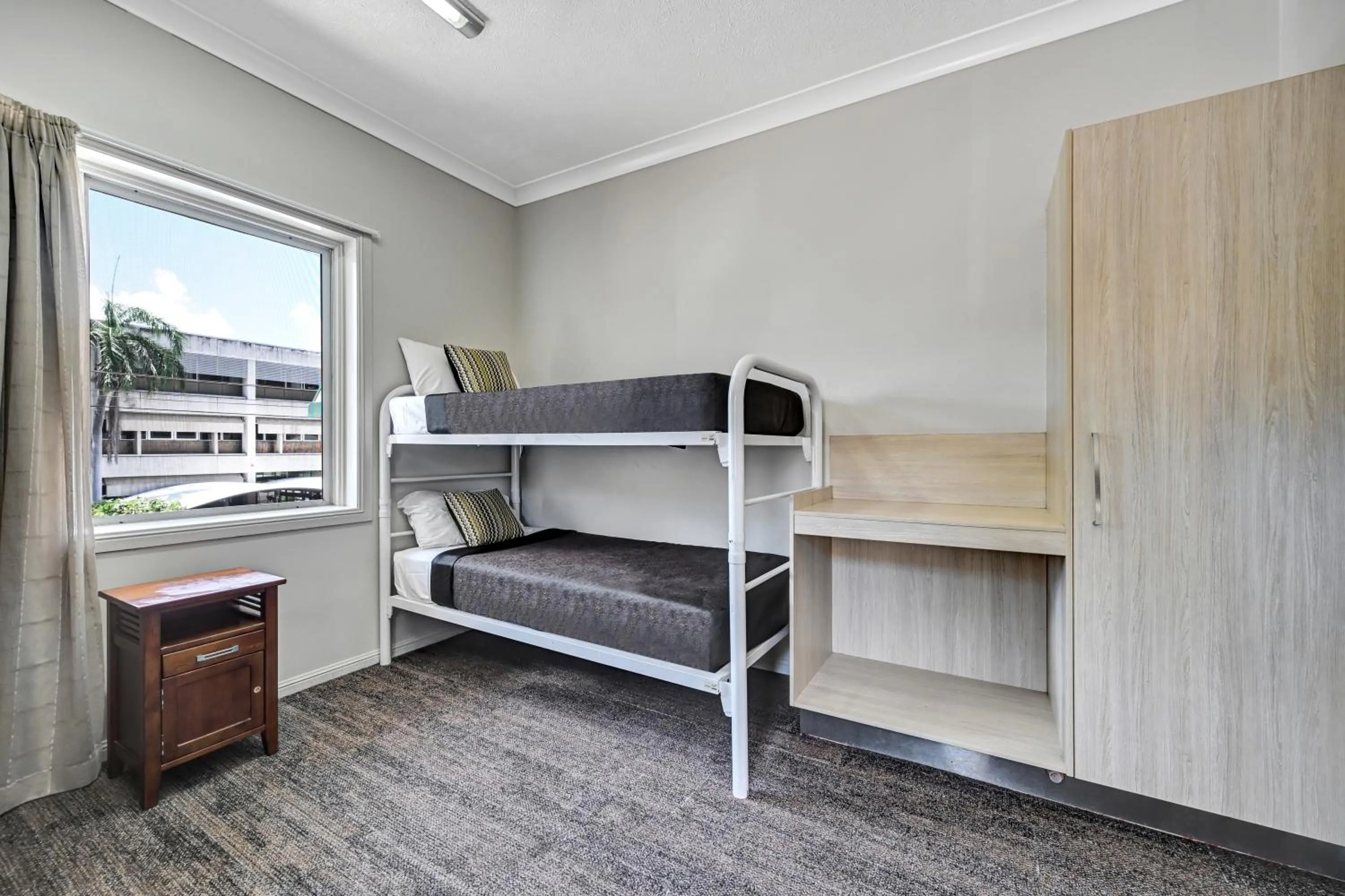 Bed in City Oasis Inn Townsville, SureStay Collection by BW