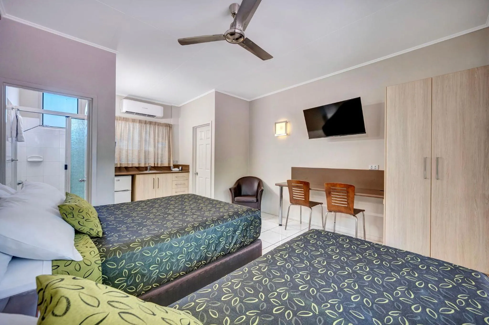 Bed in City Oasis Inn Townsville, SureStay Collection by BW